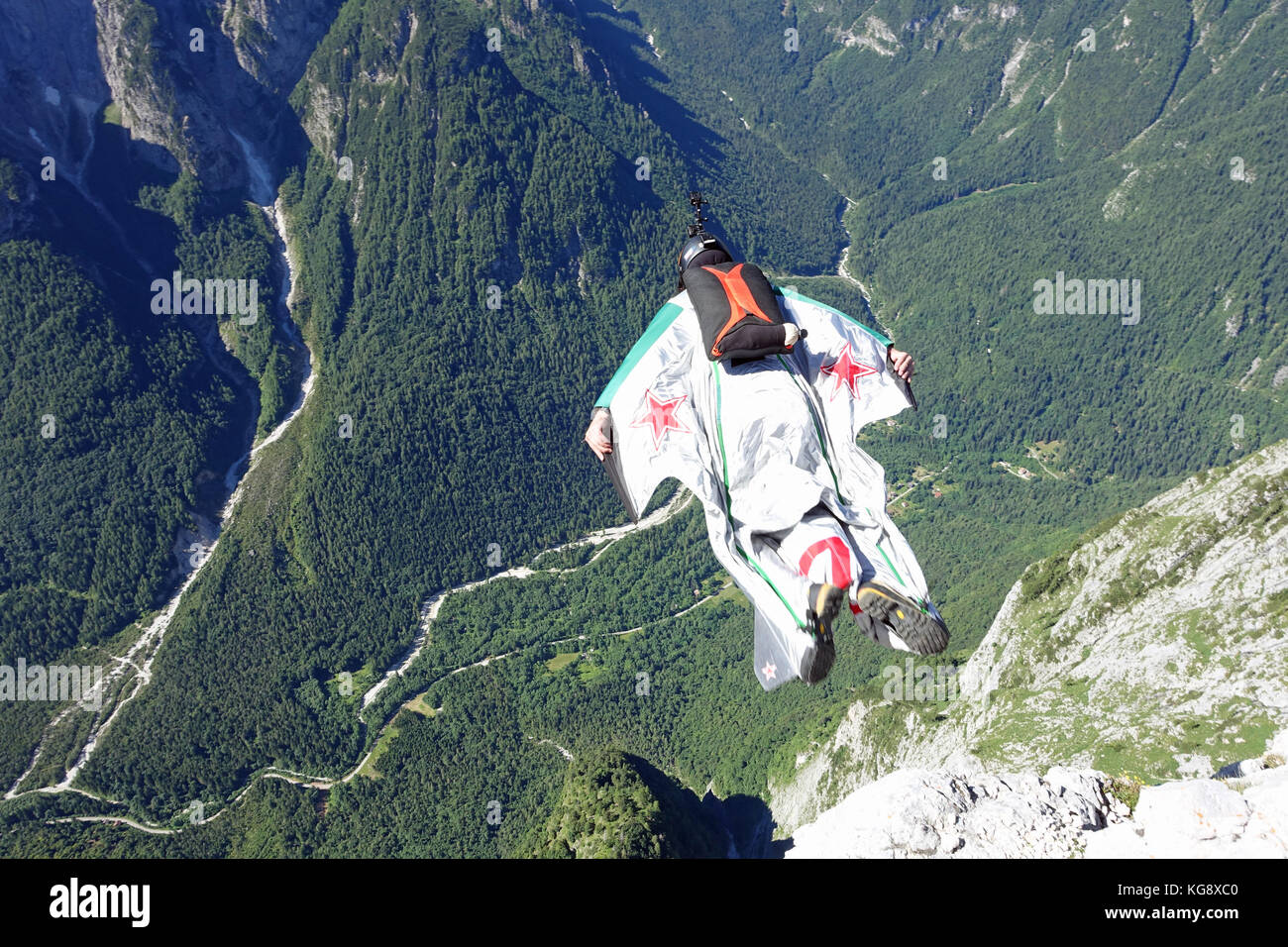 This Wingsuit BASE jumper just stepped over the cliff edge and is brave