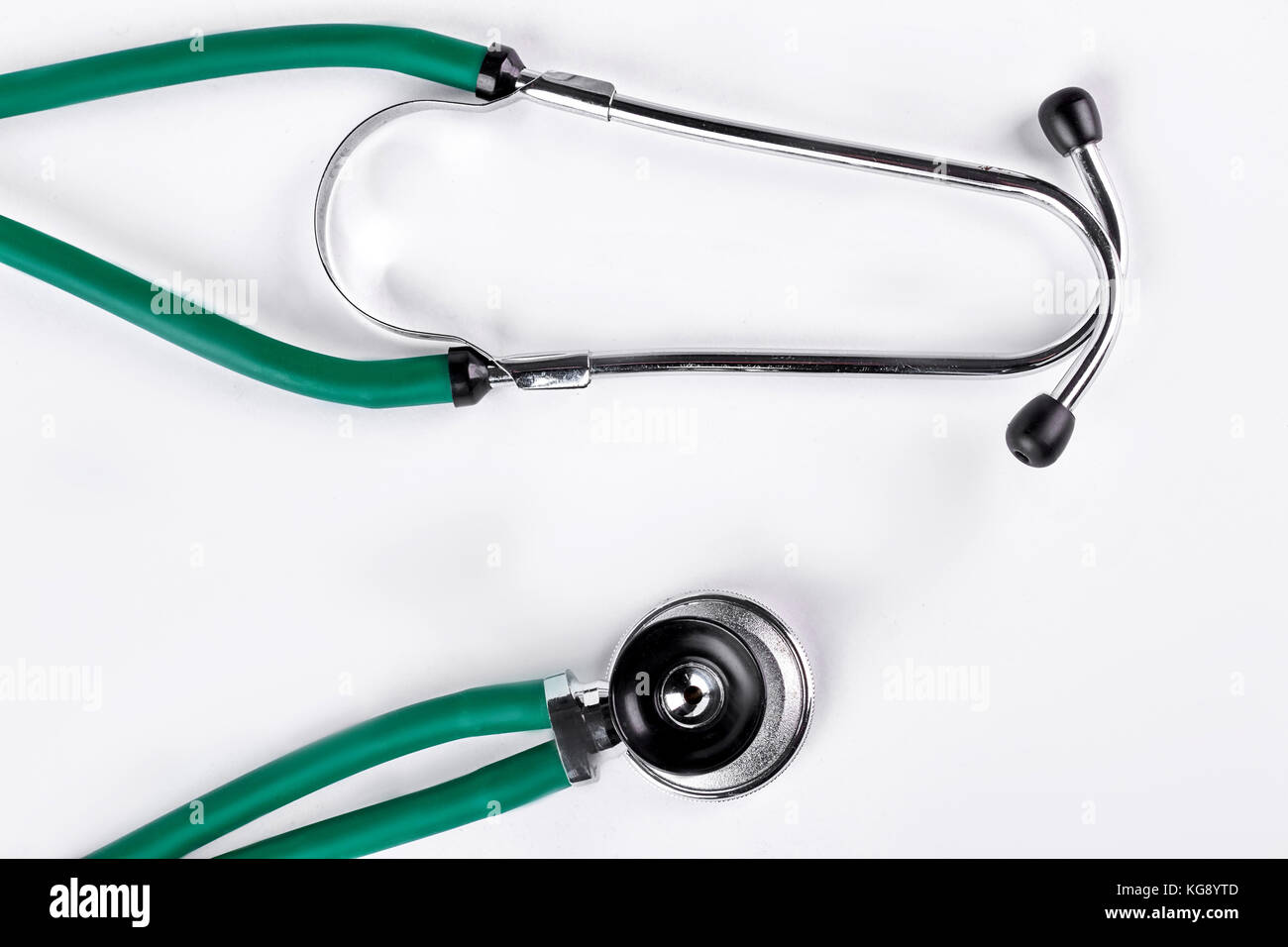 Medical green stethoscope, white background Stock Photo Alamy