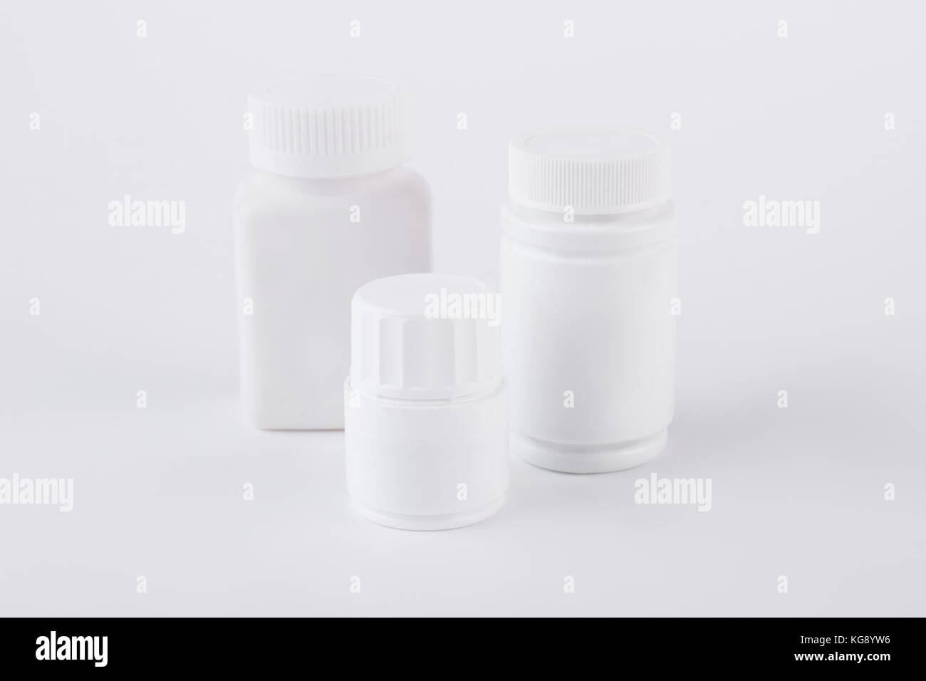 Three different sizes pills bottles Stock Photo Alamy