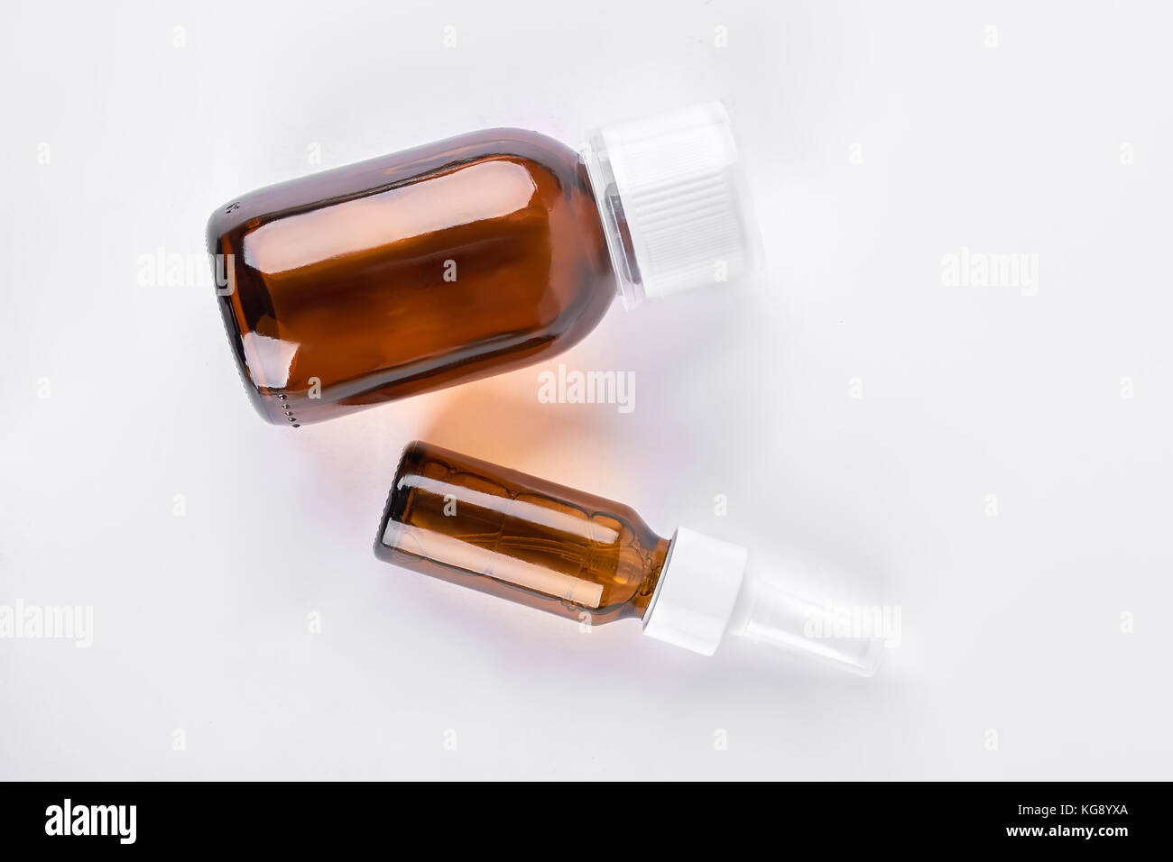 Brown glass bottles with medicine. Stock Photo