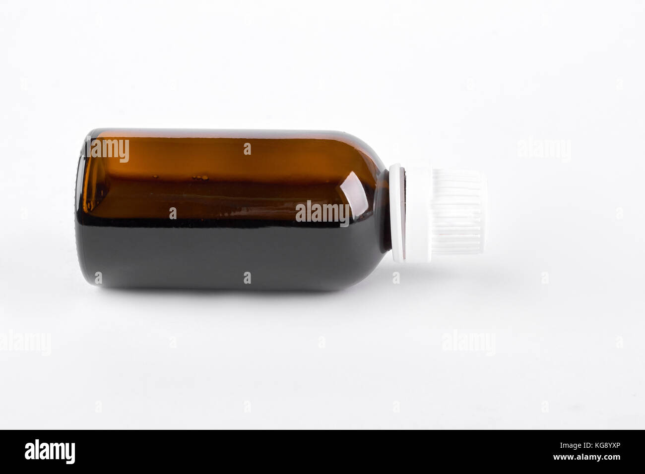 Glass bottle with cough syrup Stock Photo Alamy