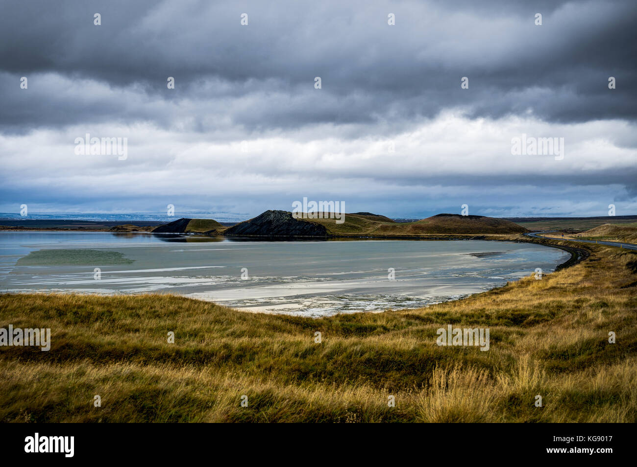 Sunset View Iceland towards mountains with grass water and cloud Stock ...
