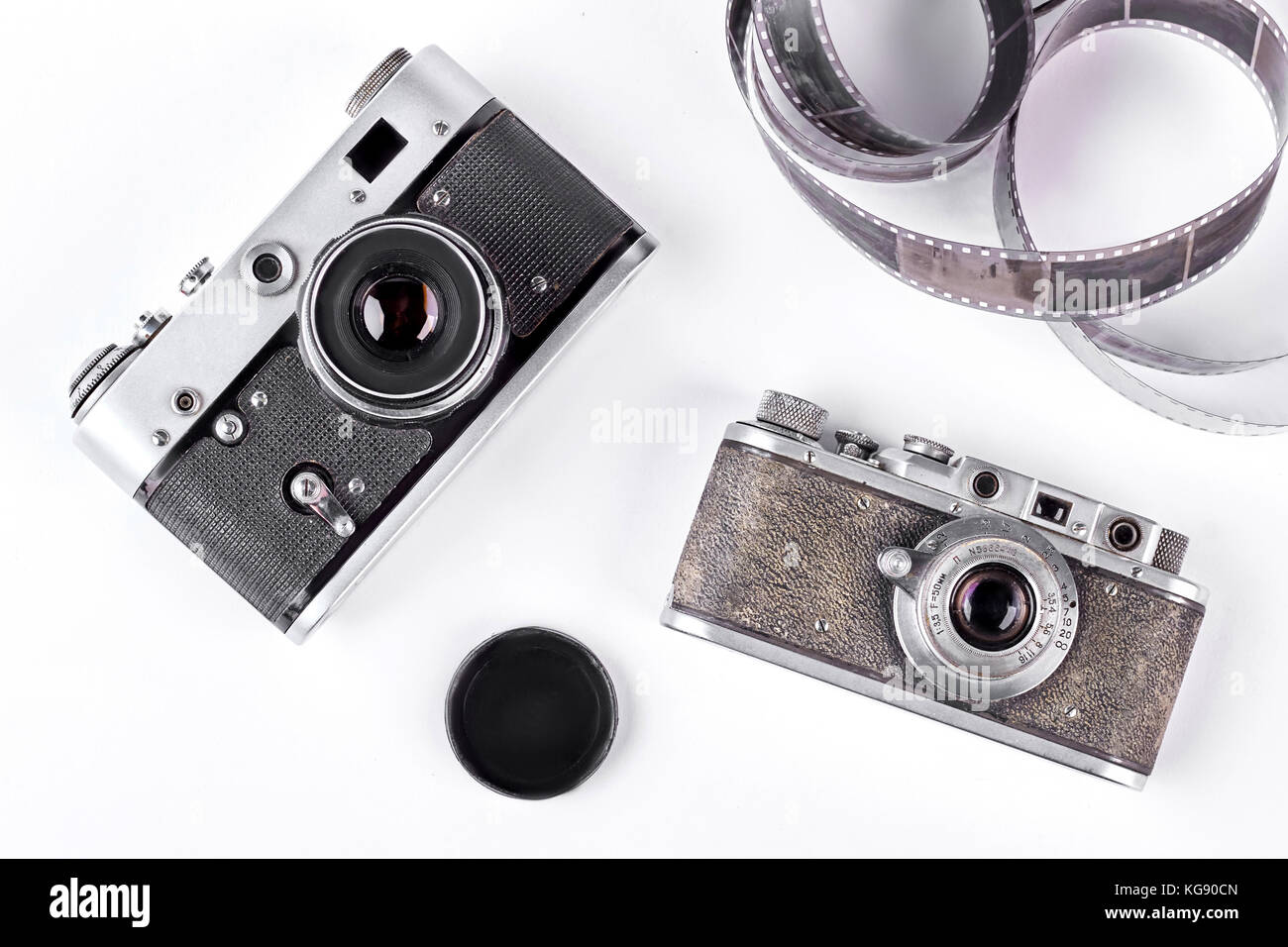 Obsolete cameras on white background Stock Photo Alamy