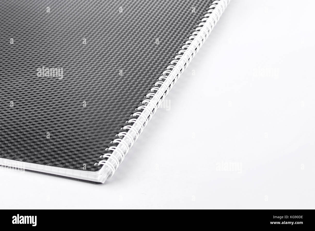 Black notepad with white spiral. Stock Photo