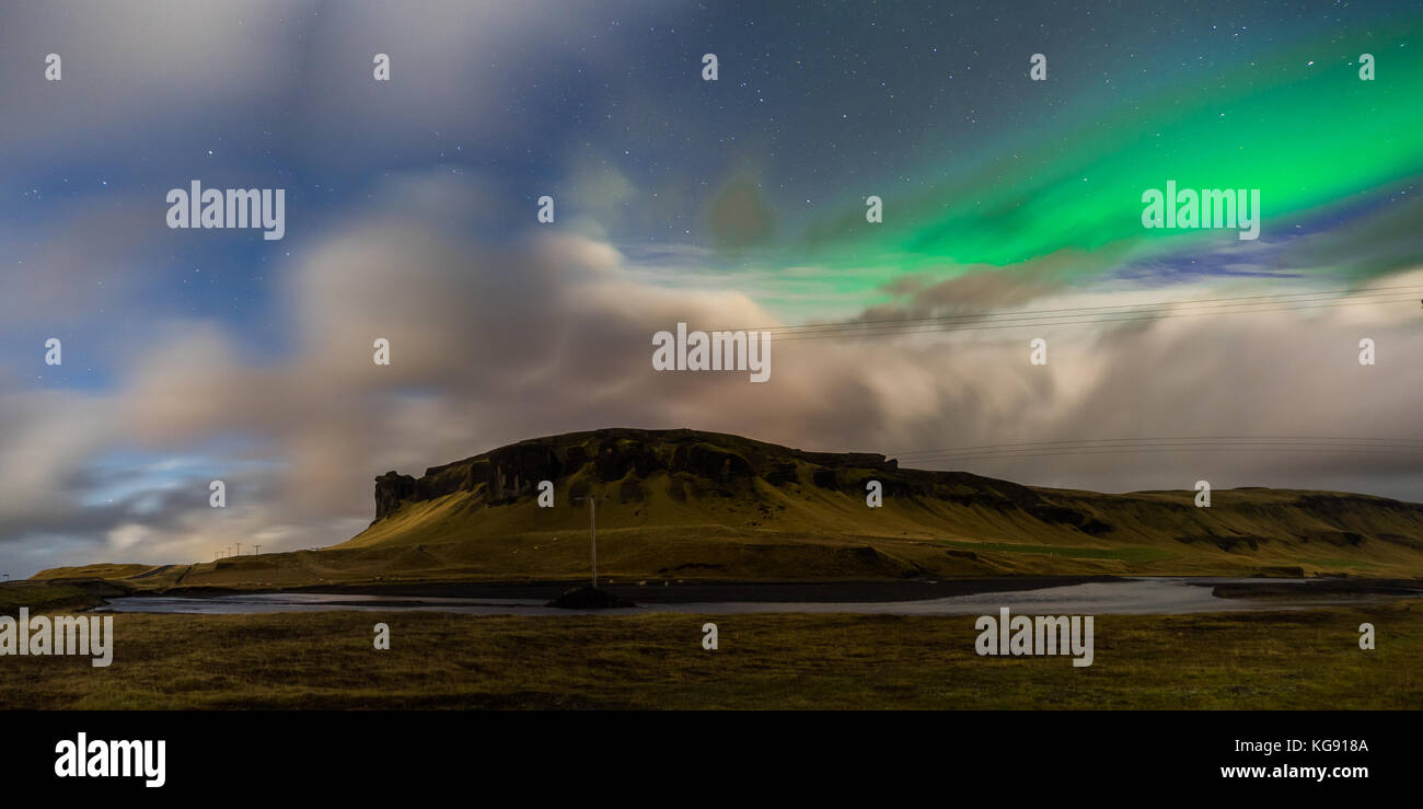 Northern lights Aurora Borealis above landscape in Iceland Stock Photo ...