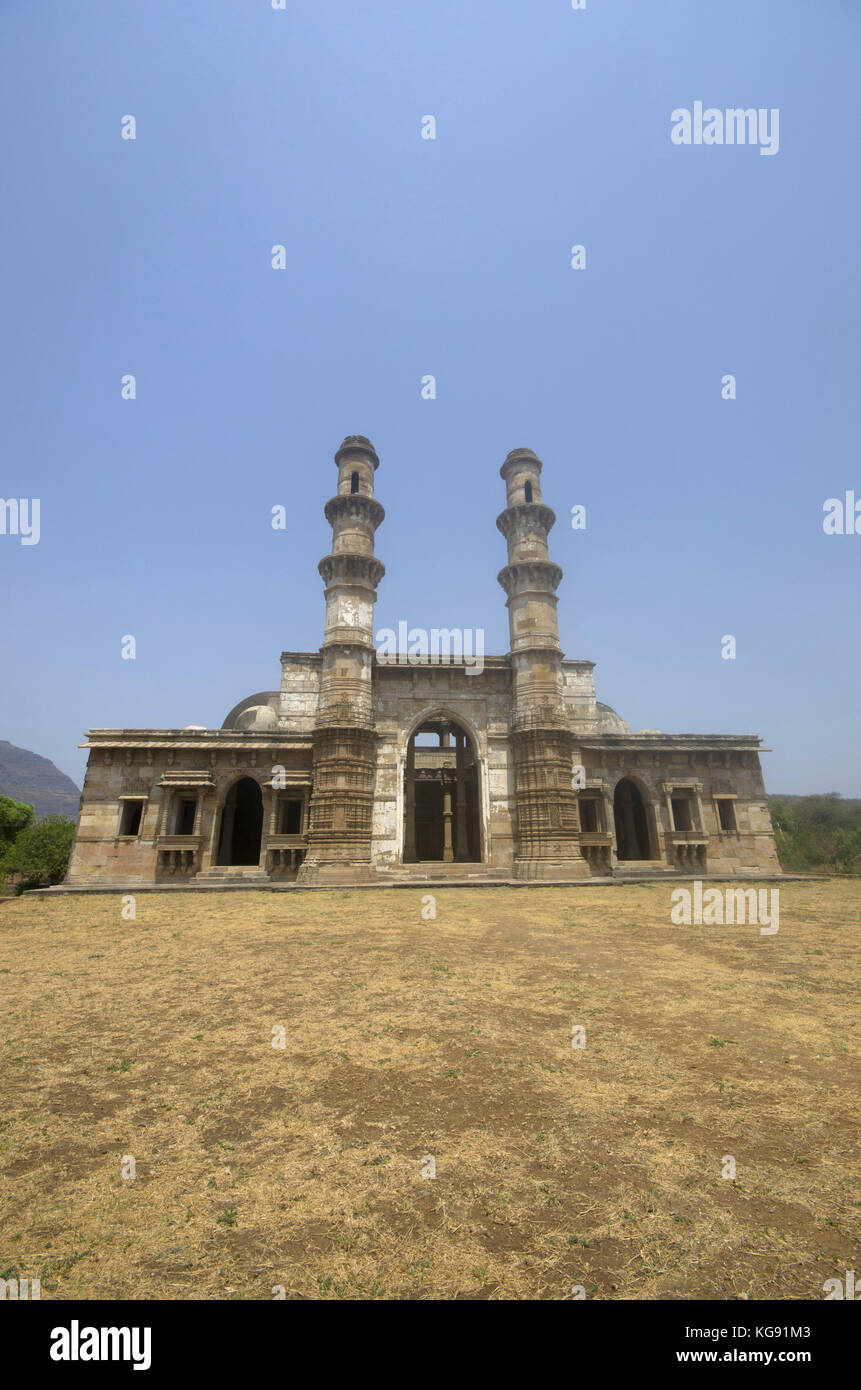 Outer view of Kevada Masjid (Mosque), has minarets, globe like domes and narrow stairs. Built in Champaner during the time of Mahmud Begada, UNESCO pr Stock Photo
