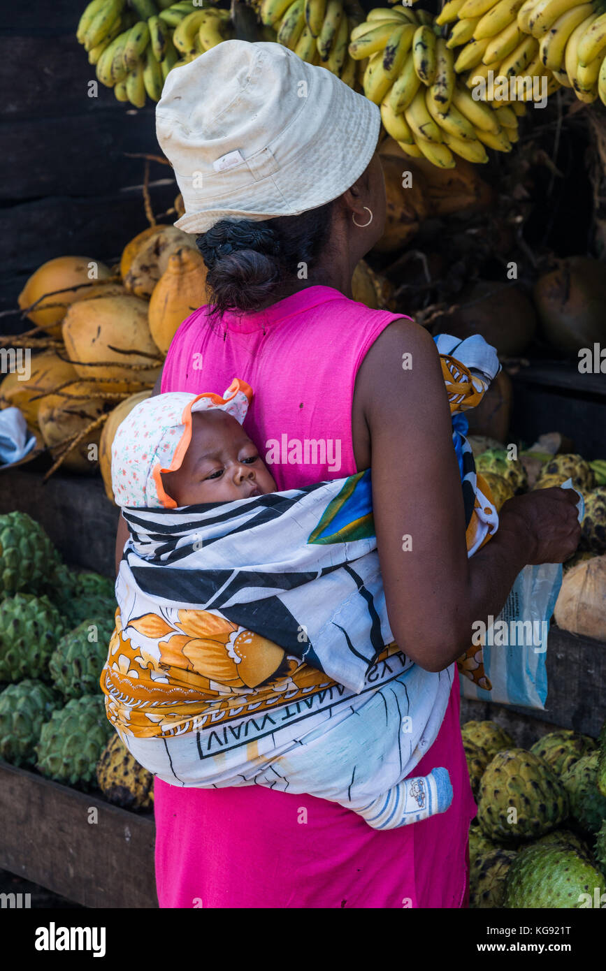 A Malagasy woman with baby on her back. Madagascar, Africa. Stock Photo