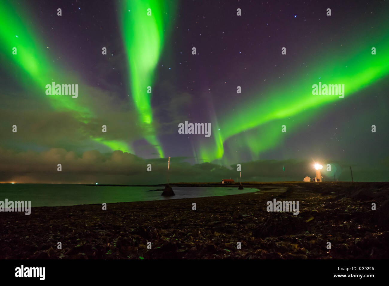 Northern lights Aurora Borealis above landscape in Iceland Stock Photo ...