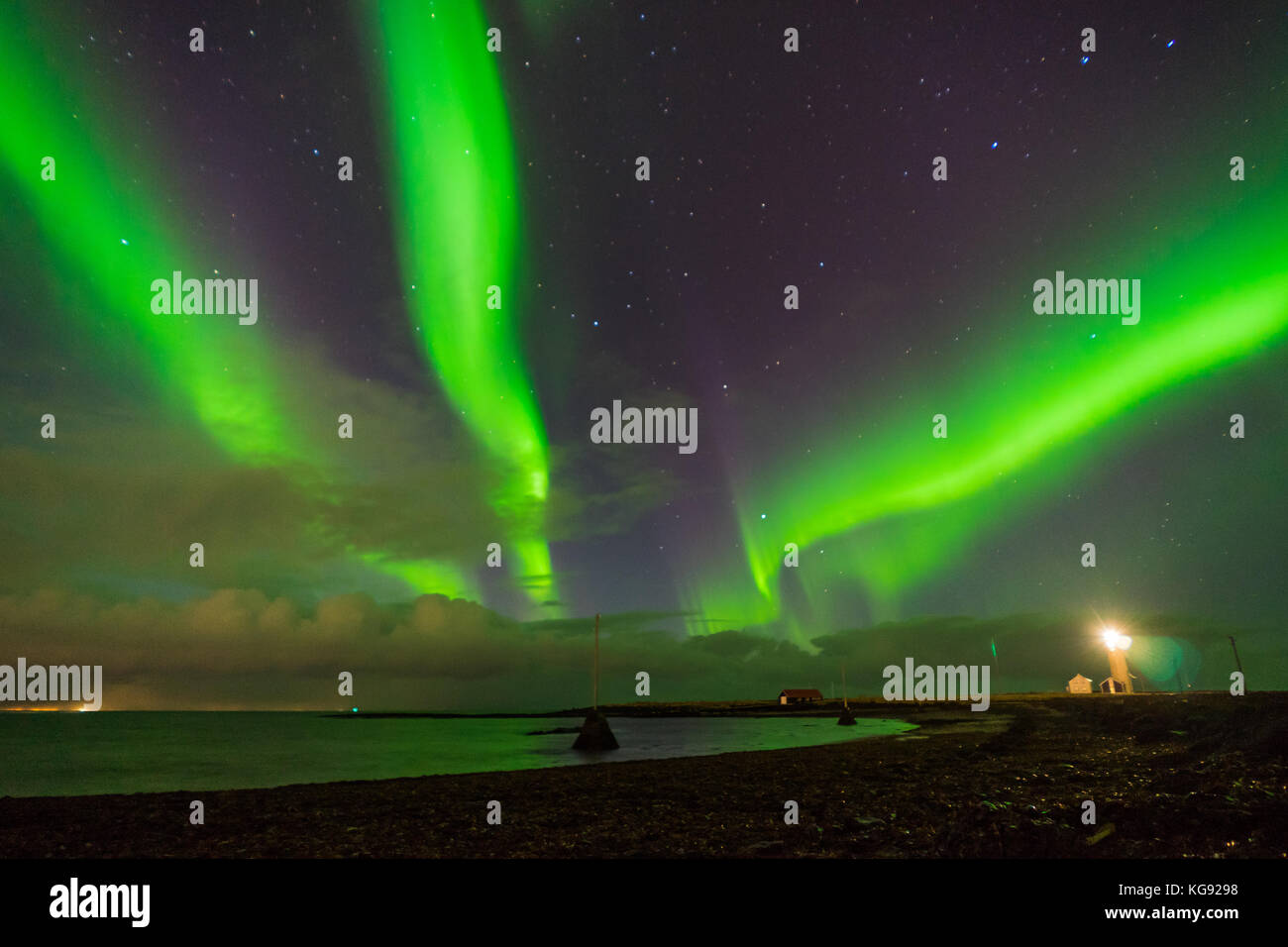 Northern lights Aurora Borealis above landscape in Iceland Stock Photo ...