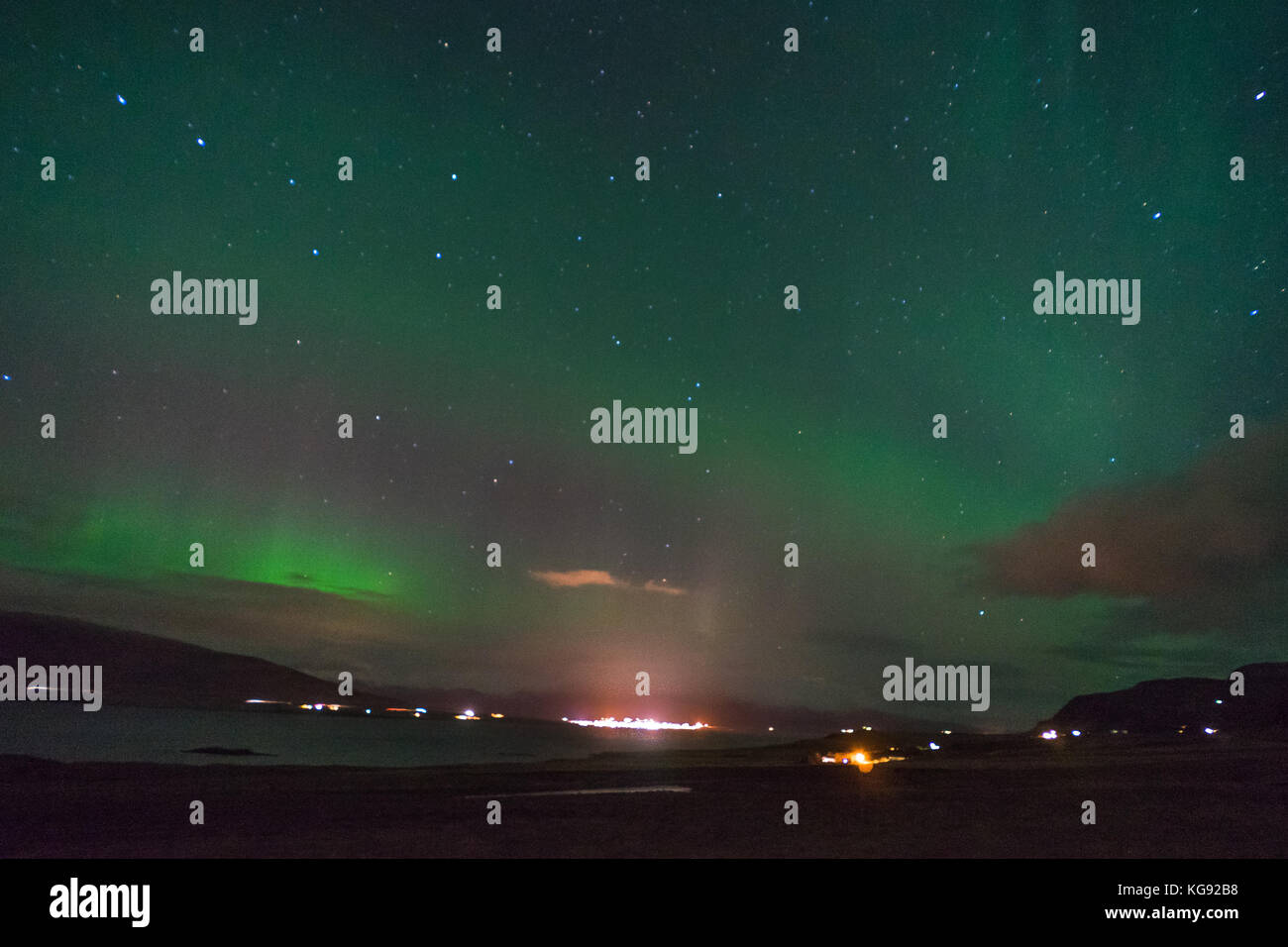 Northern lights Aurora Borealis above landscape in Iceland Stock Photo ...