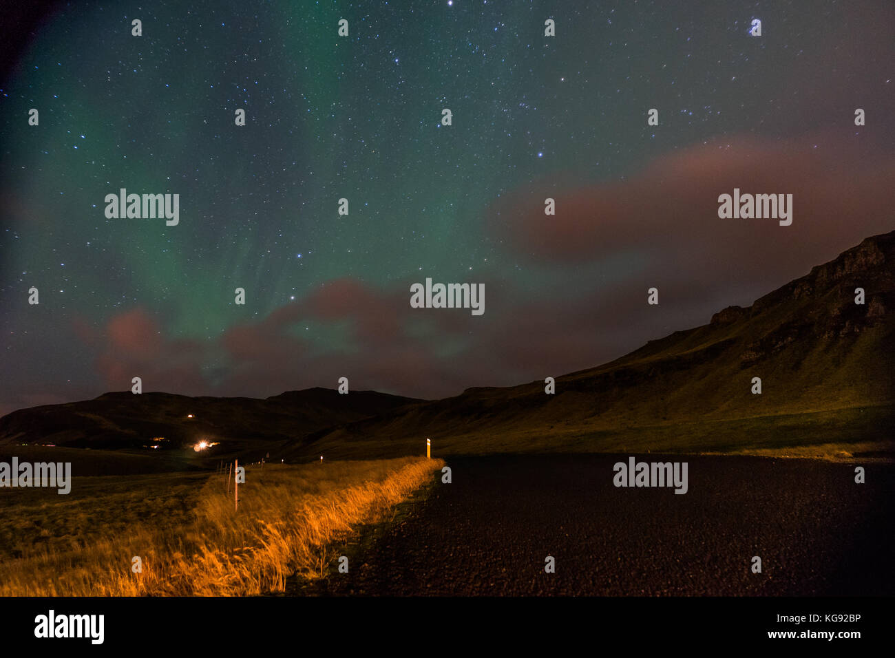 Northern lights Aurora Borealis above landscape in Iceland Stock Photo ...