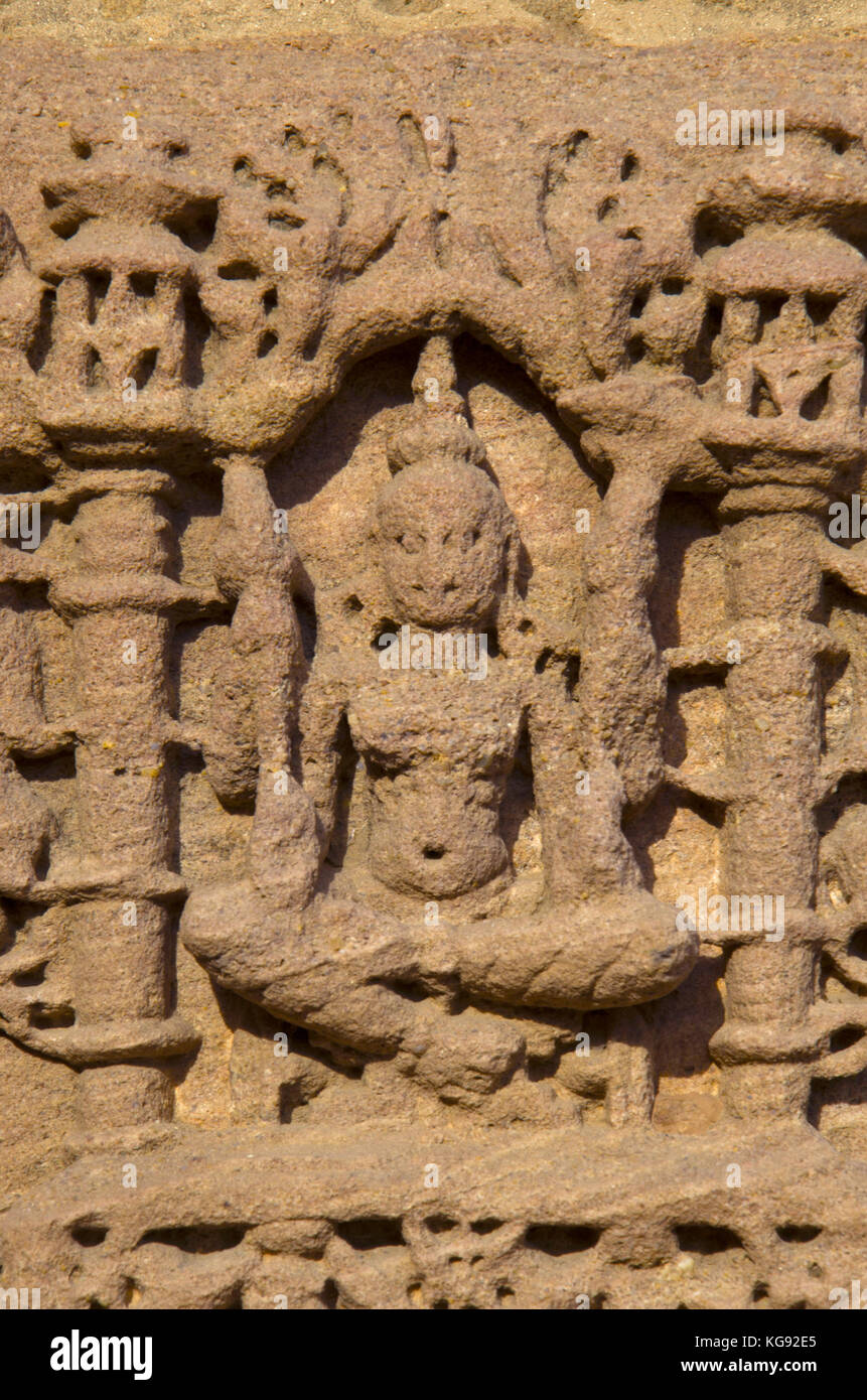 Carving details on the outer wall of the Sun Temple. Built in 1026 - 27 AD during the reign of Bhima I of the Chaulukya dynasty, Modhera village of Me Stock Photo