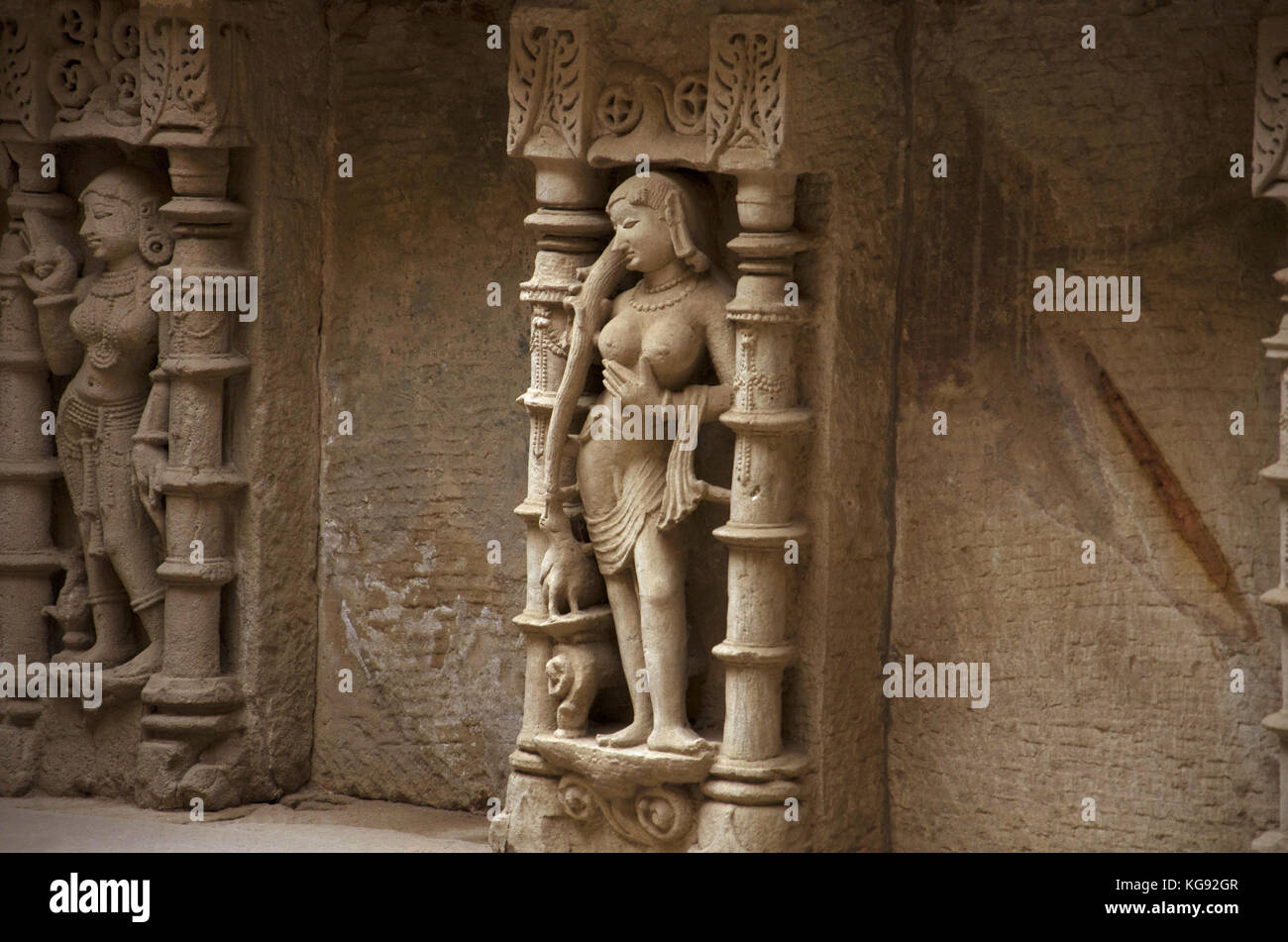 Carving details of an idol of apsara, located on the inner wall of Rani ki vav.  Patan, Gujarat, India. Stock Photo