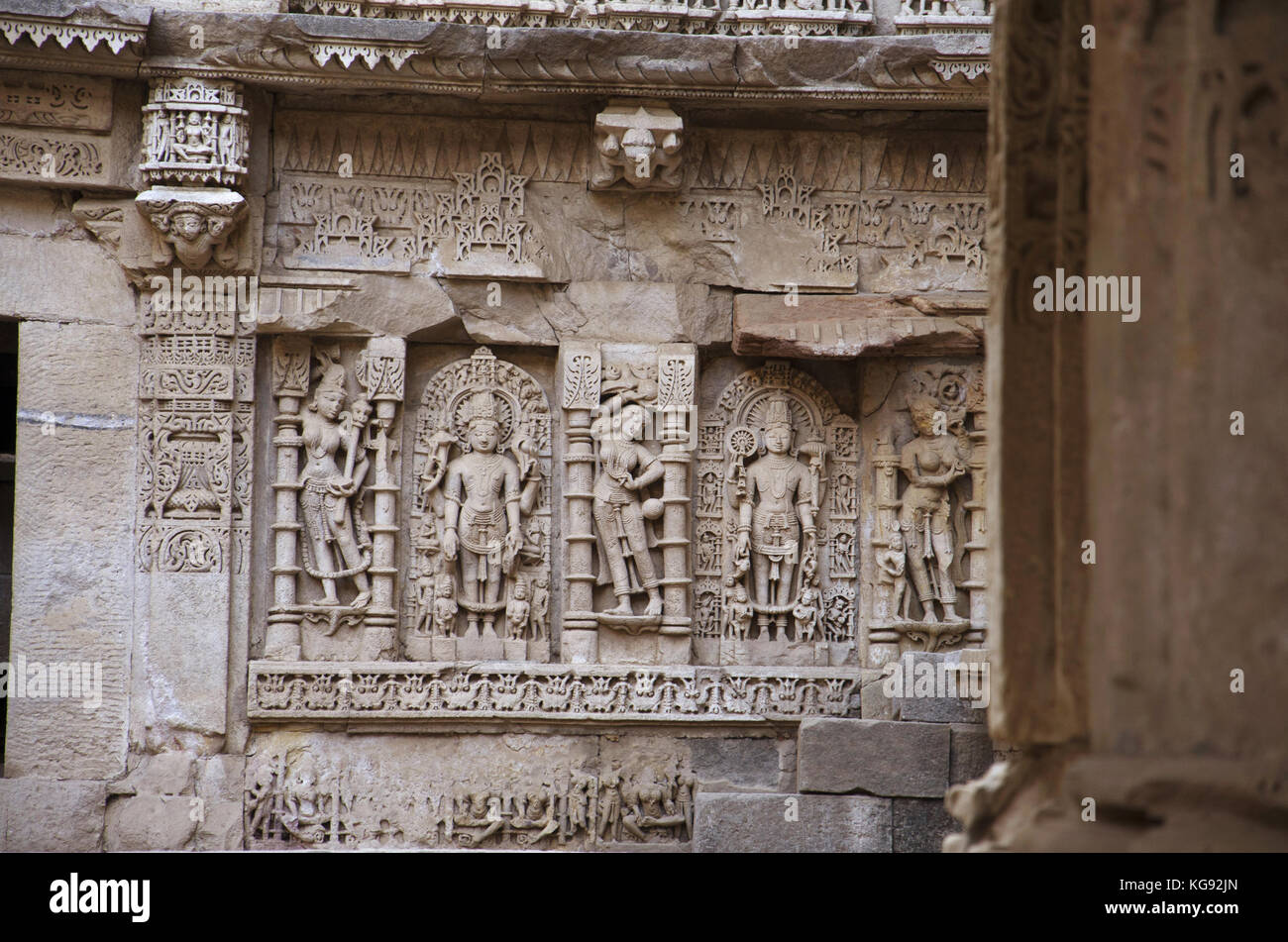 Carved idols on the inner wall and pillars of Rani ki vav, an intricately constructed stepwell on the banks of Saraswati River.  Patan, Gujarat, India Stock Photo