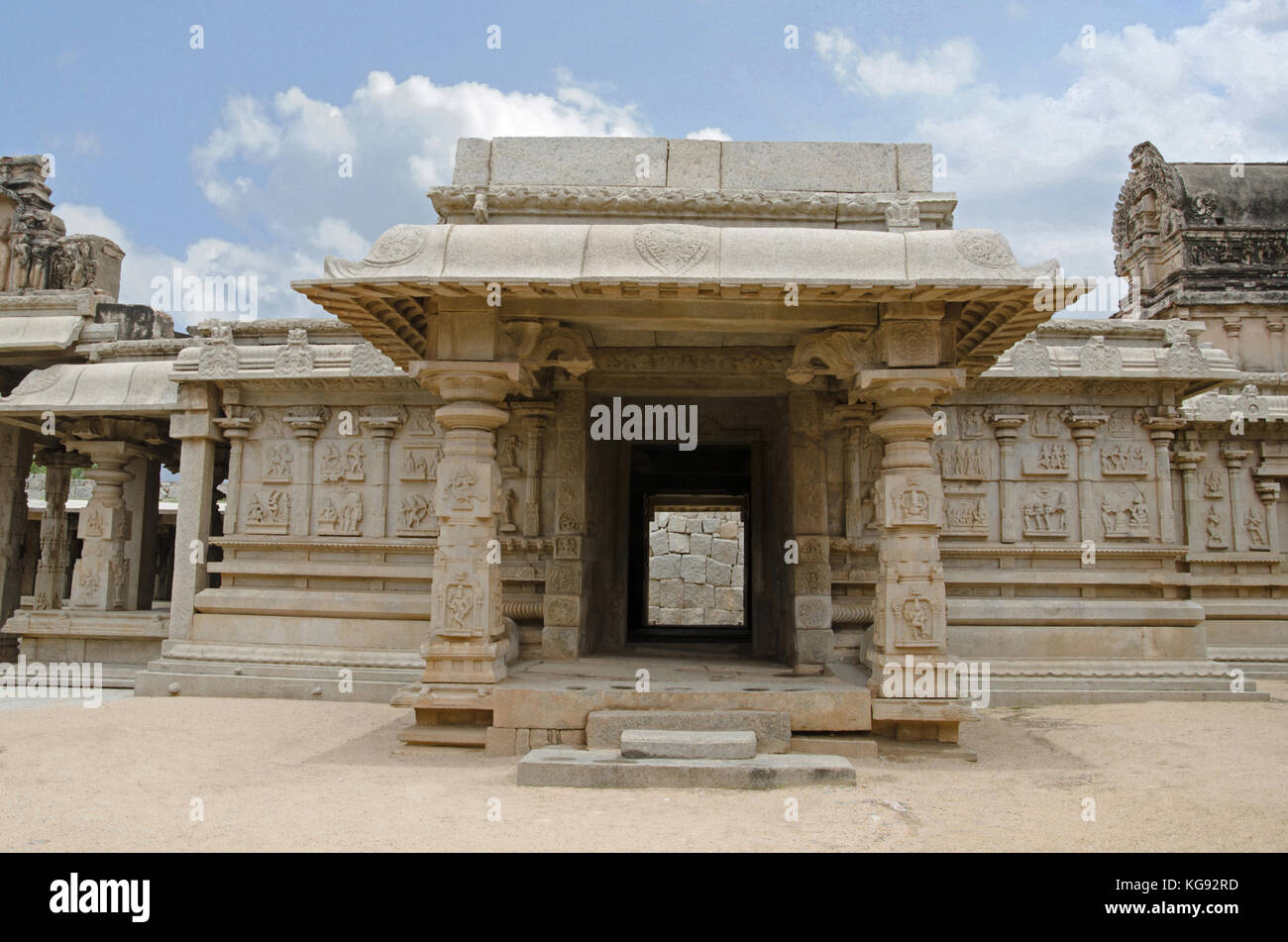 Carving details on the outer wall of Hazara Rama Temple. Hampi, Karnataka, India. Famous for the lovely bas relics and panels depicting the story of t Stock Photo