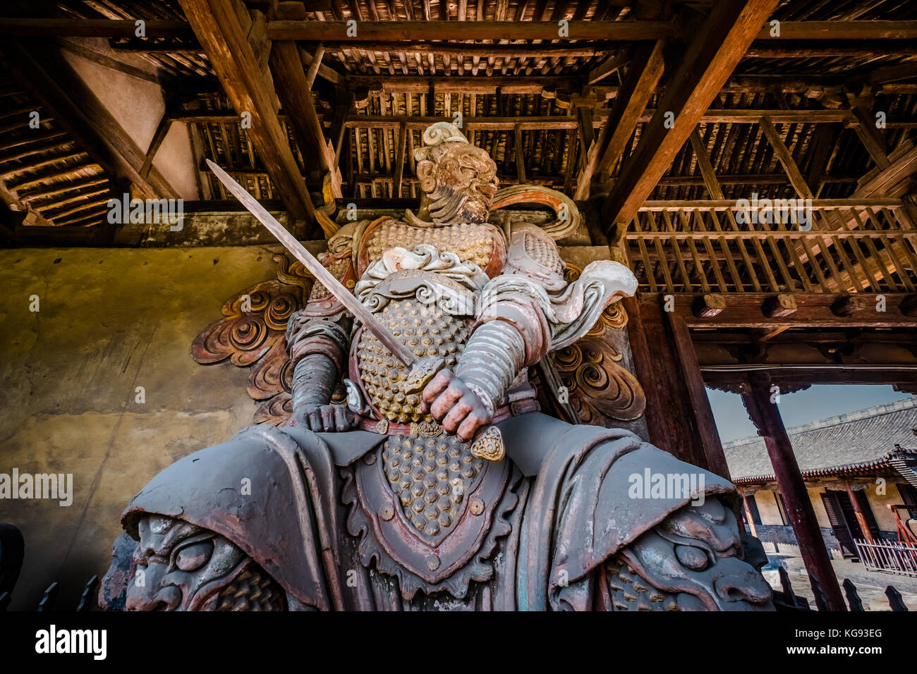 Giant warrior statue in an ancient temple in Pingyao, China August