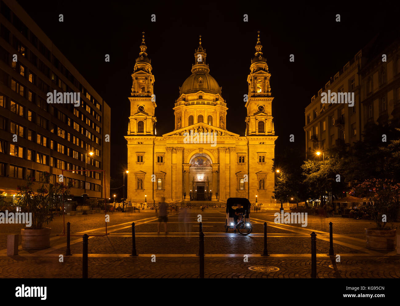 St. Stephen's Basilica illuminated at night in city of Budapest, Hungary, Neoclassical style architecture. Stock Photo