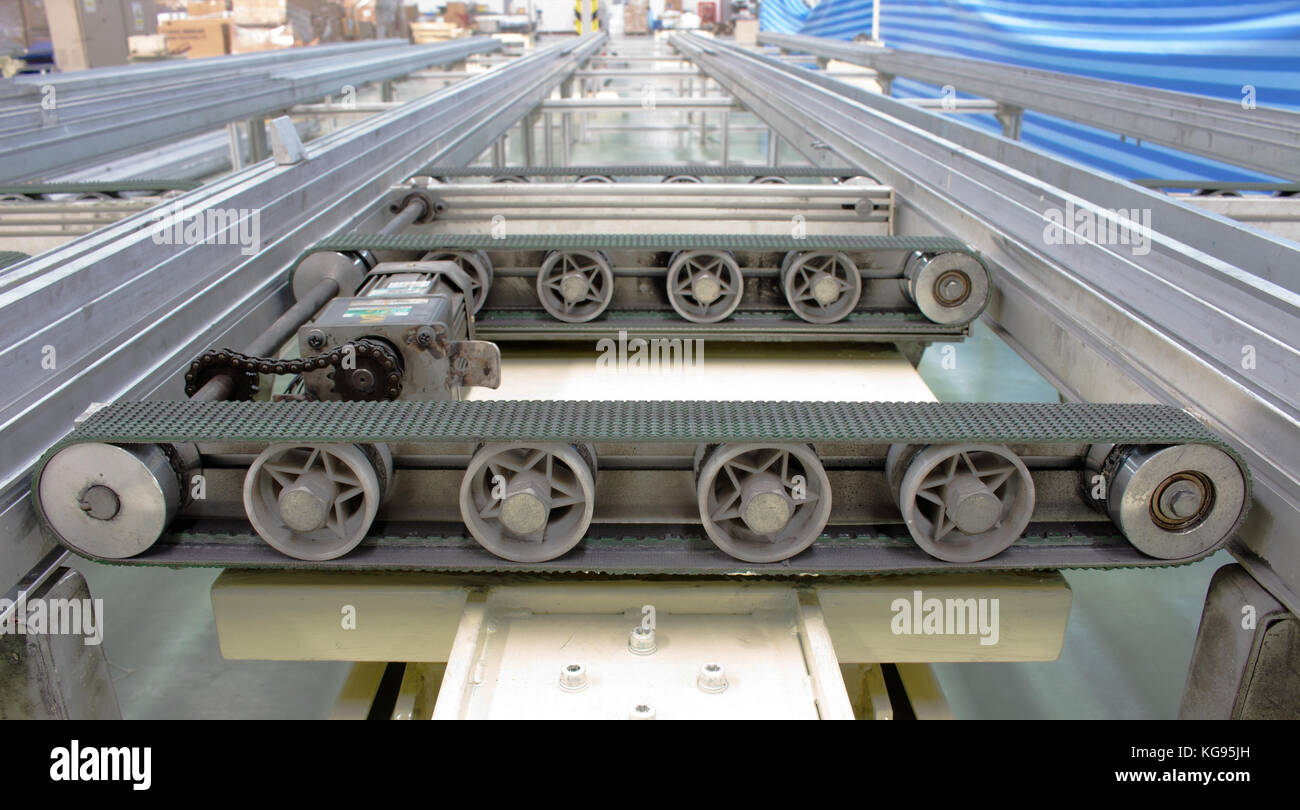 Conveyor belt wheel hires stock photography and images Alamy