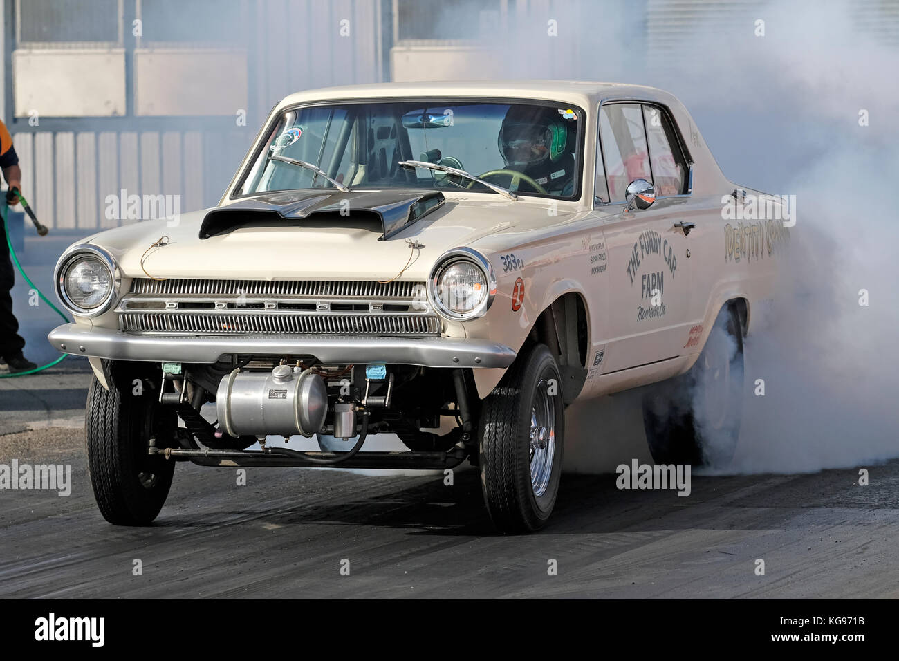 The Funny Car Farm Dodge Dart Gasser Dragster burns out at Santa Pod Raceway Stock Photo