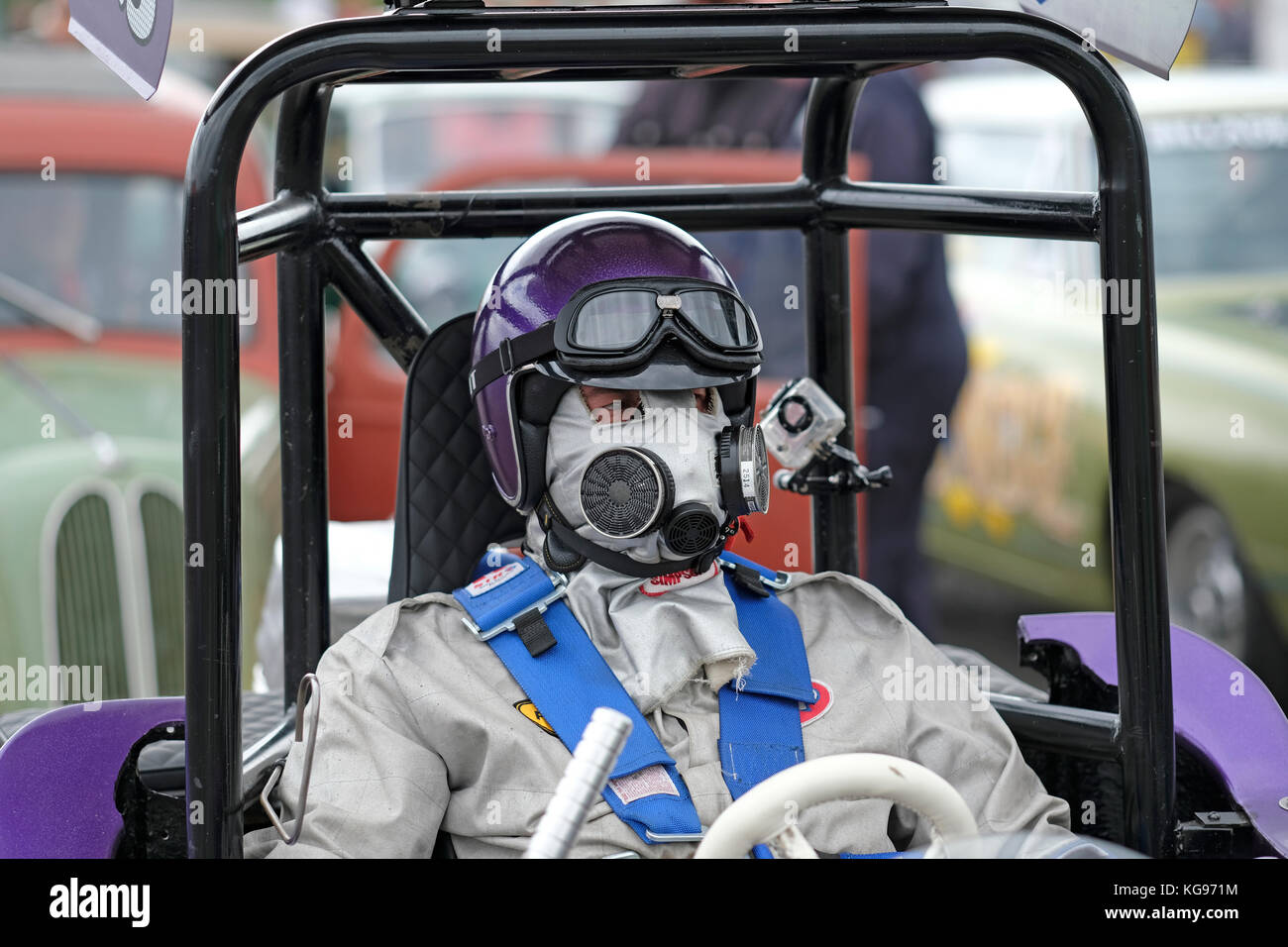 Drag Racer in mask at Santa Pod Raceway England Stock Photo 164930912