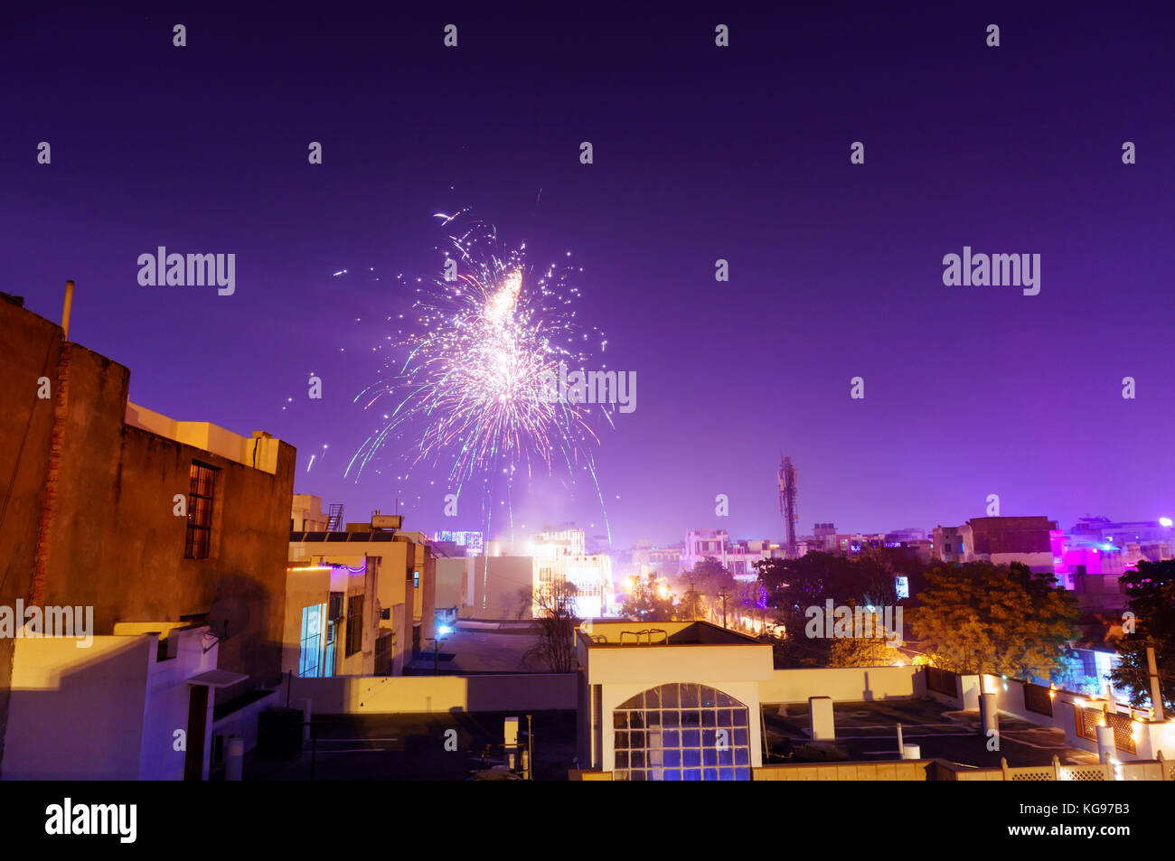 Beautiful fireworks over the suburb homes in jaipur city. This is a common sight on diwali, makar sankranti and dussera Stock Photo