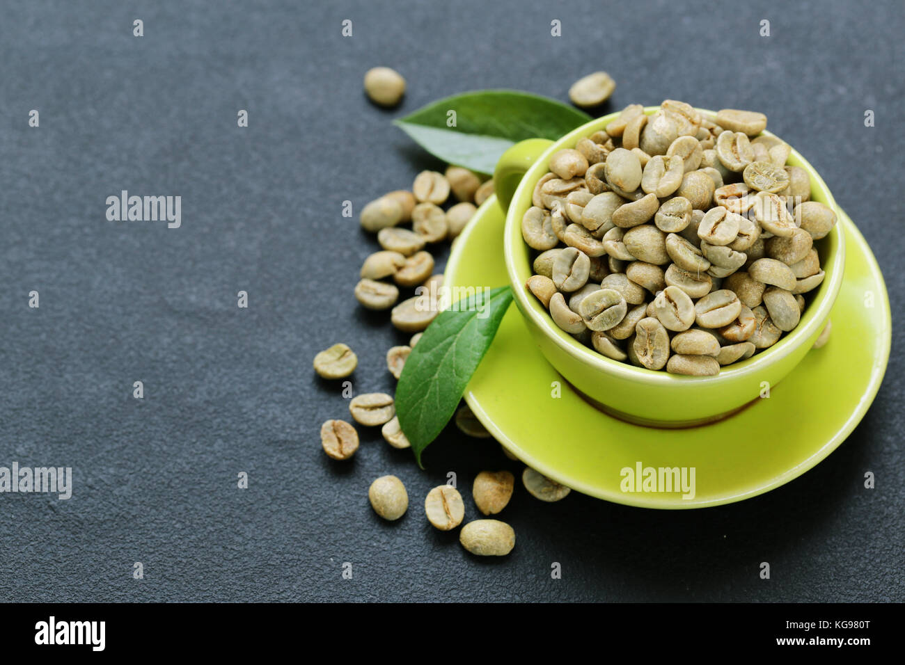 natural organic green coffee beans on a black background Stock Photo