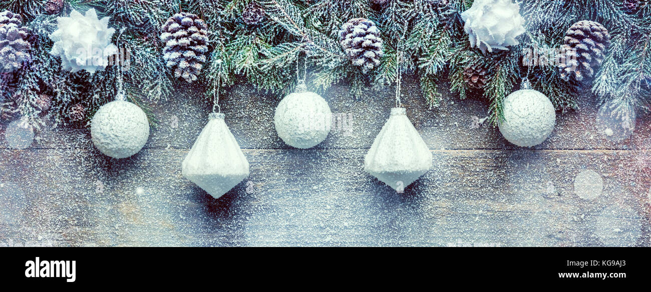 Snowy Christmas Background, Fir Tree Branches With Pine Cones And Xmas ...