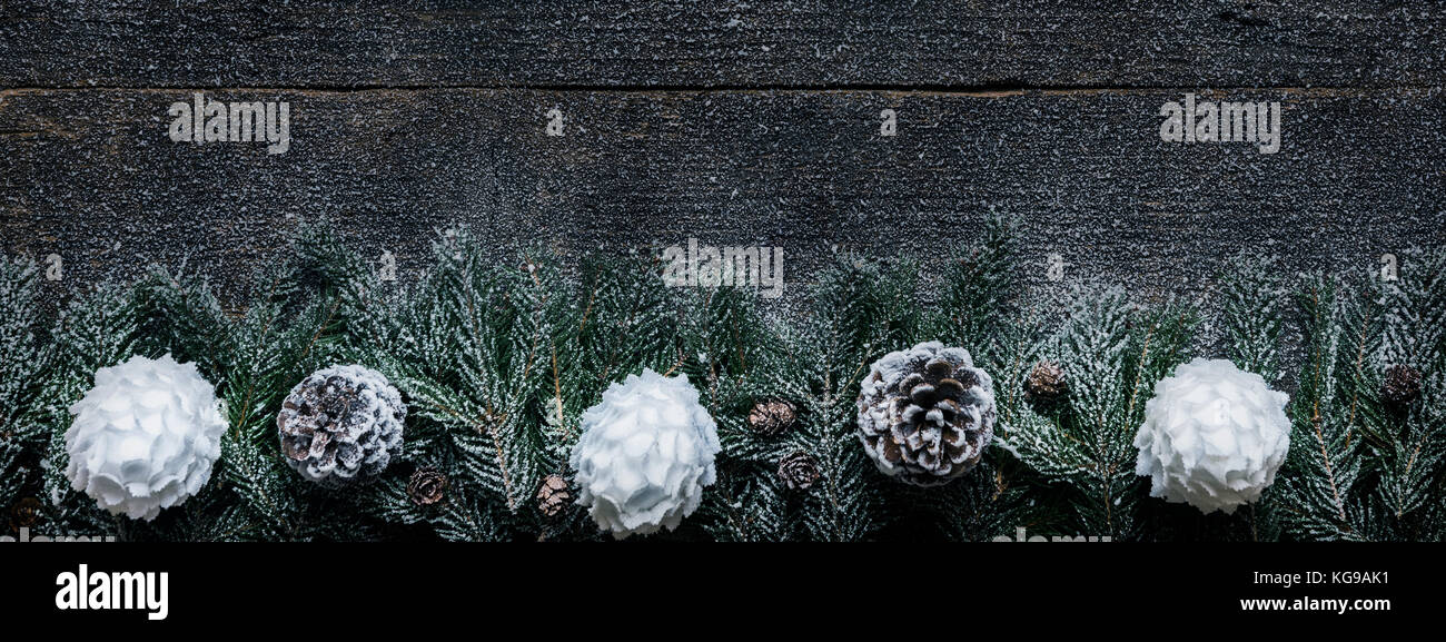Snowy Christmas Background, Fir Tree Branches With Pine Cones And Xmas ...