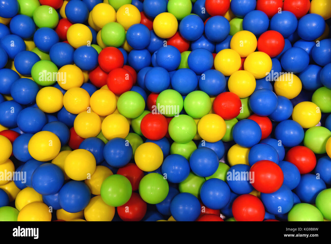 Colorful balls for kids games.  Fun and safe, kids play in the middle. Very popular in kindergartens and playrooms. Ideal photo for backgrounds. Stock Photo
