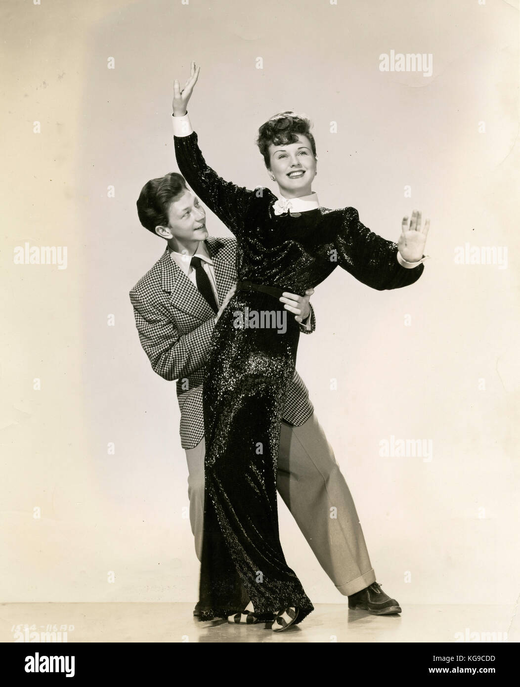 Actors Donald O' Connor and Deanna Durbin in the film Something in the Wind, 1947 Stock Photo