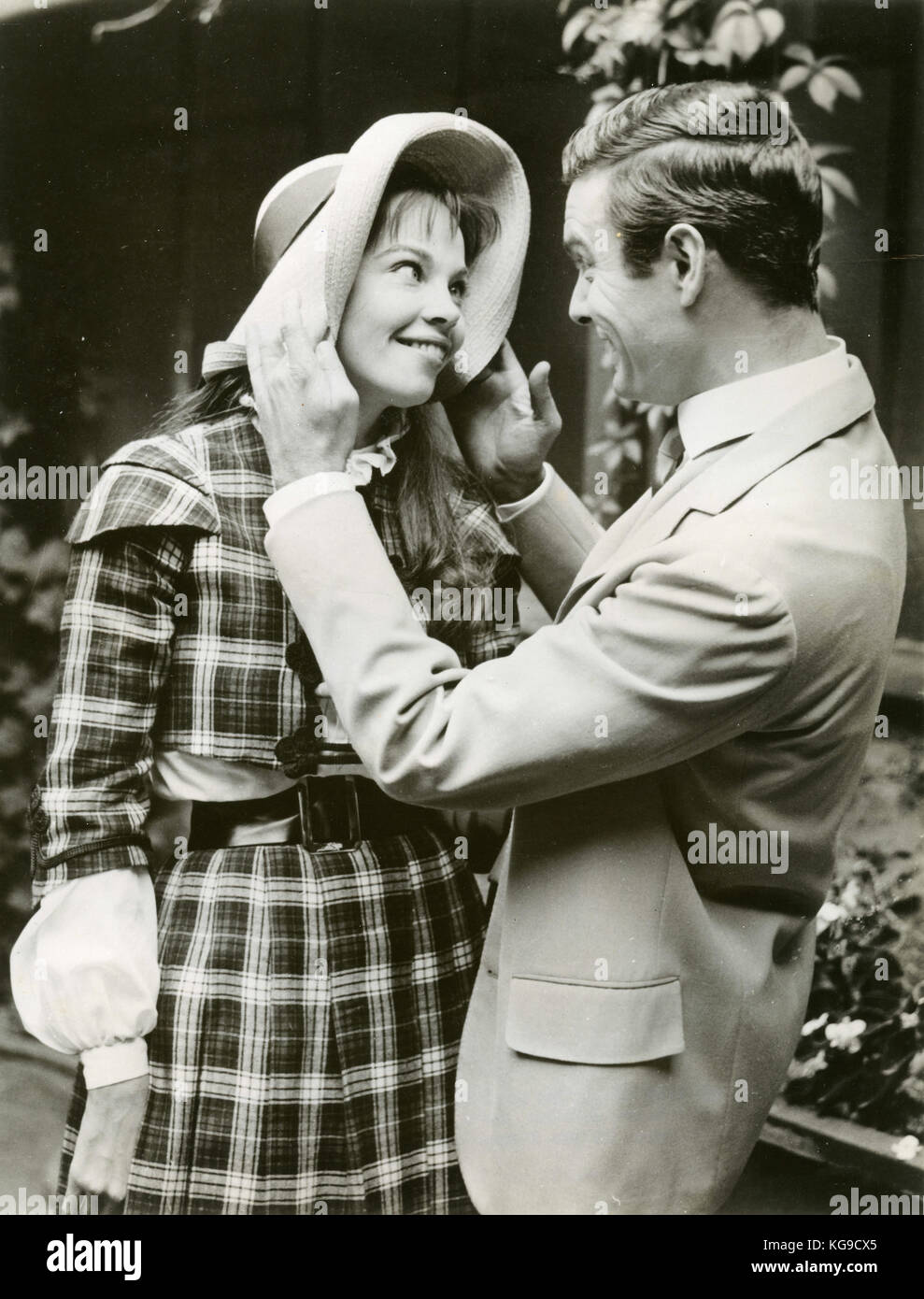 Actors Leslie Caron and Louis Jourdan in Bois de Bologne while filming the novie Gigi, 1958 Stock Photo