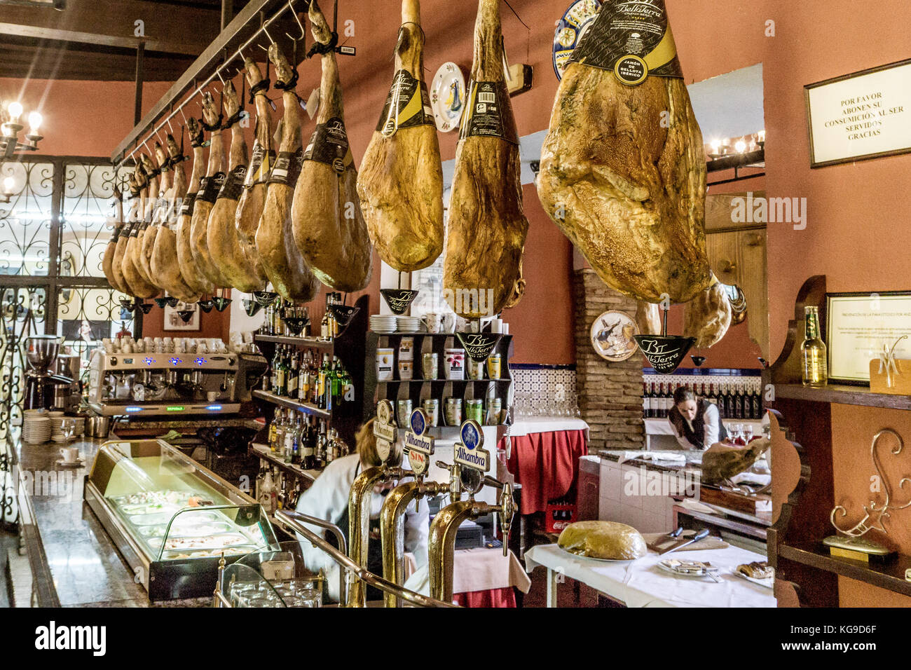 Ham hanging in a cafe in Cordoba Stock Photo