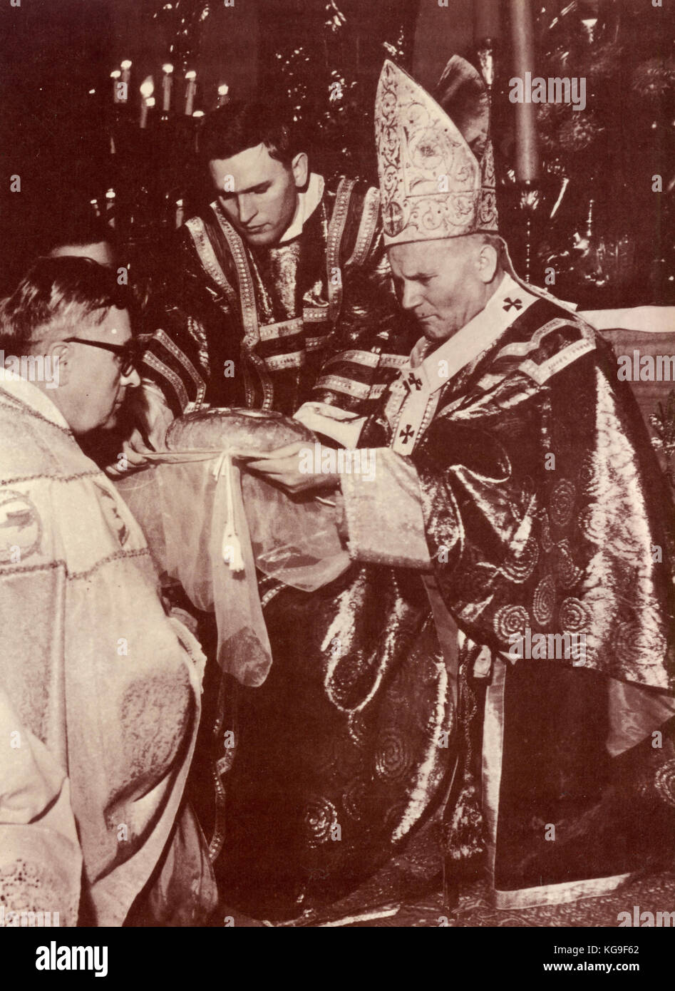 Pope John Paul II when Cardinal Woytyla serving mess Stock Photo