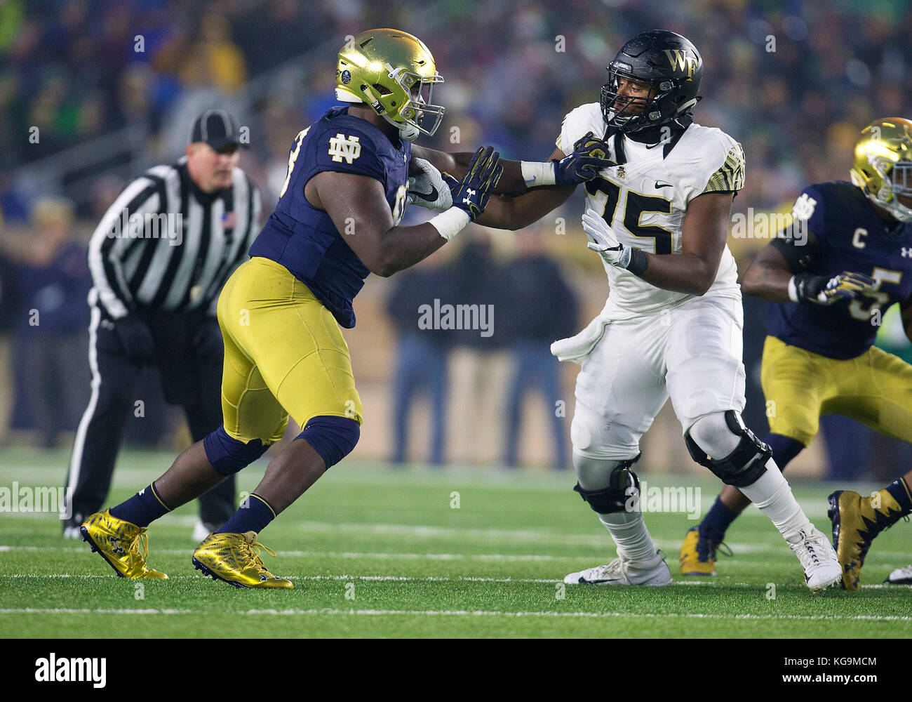 November 04, 2017: Notre Dame defensive lineman Jay Hayes (93) and Wake Forest offensive lineman Justin Herron (75) battle at the line of scrimmage during NCAA football game action between the Wake Forest Demon Deacons and the Notre Dame Fighting Irish at Notre Dame Stadium in South Bend, Indiana. Notre Dame defeated Wake Forest 48-37. John Mersits/CSM Stock Photo