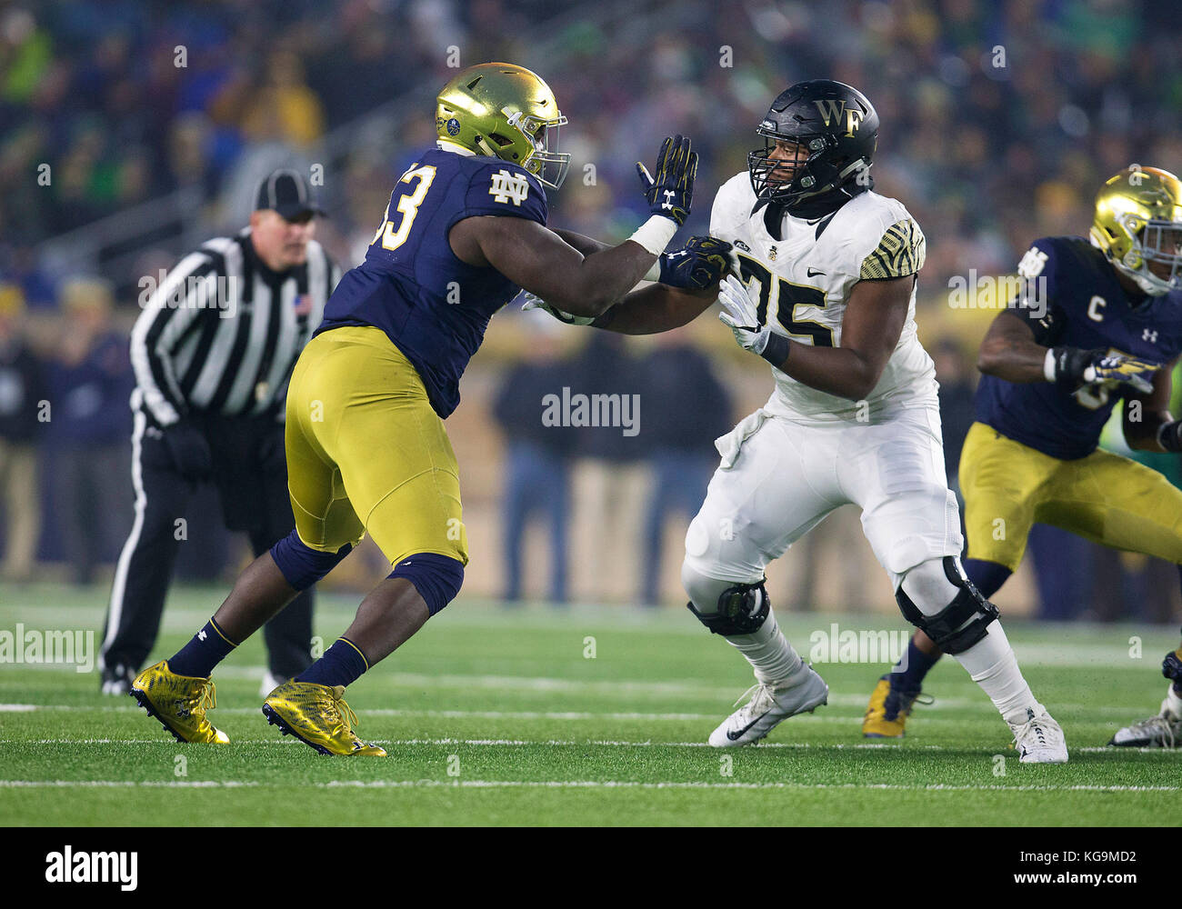 November 04, 2017: Notre Dame defensive lineman Jay Hayes (93) and Wake Forest offensive lineman Justin Herron (75) battle at the line of scrimmage during NCAA football game action between the Wake Forest Demon Deacons and the Notre Dame Fighting Irish at Notre Dame Stadium in South Bend, Indiana. Notre Dame defeated Wake Forest 48-37. John Mersits/CSM Stock Photo