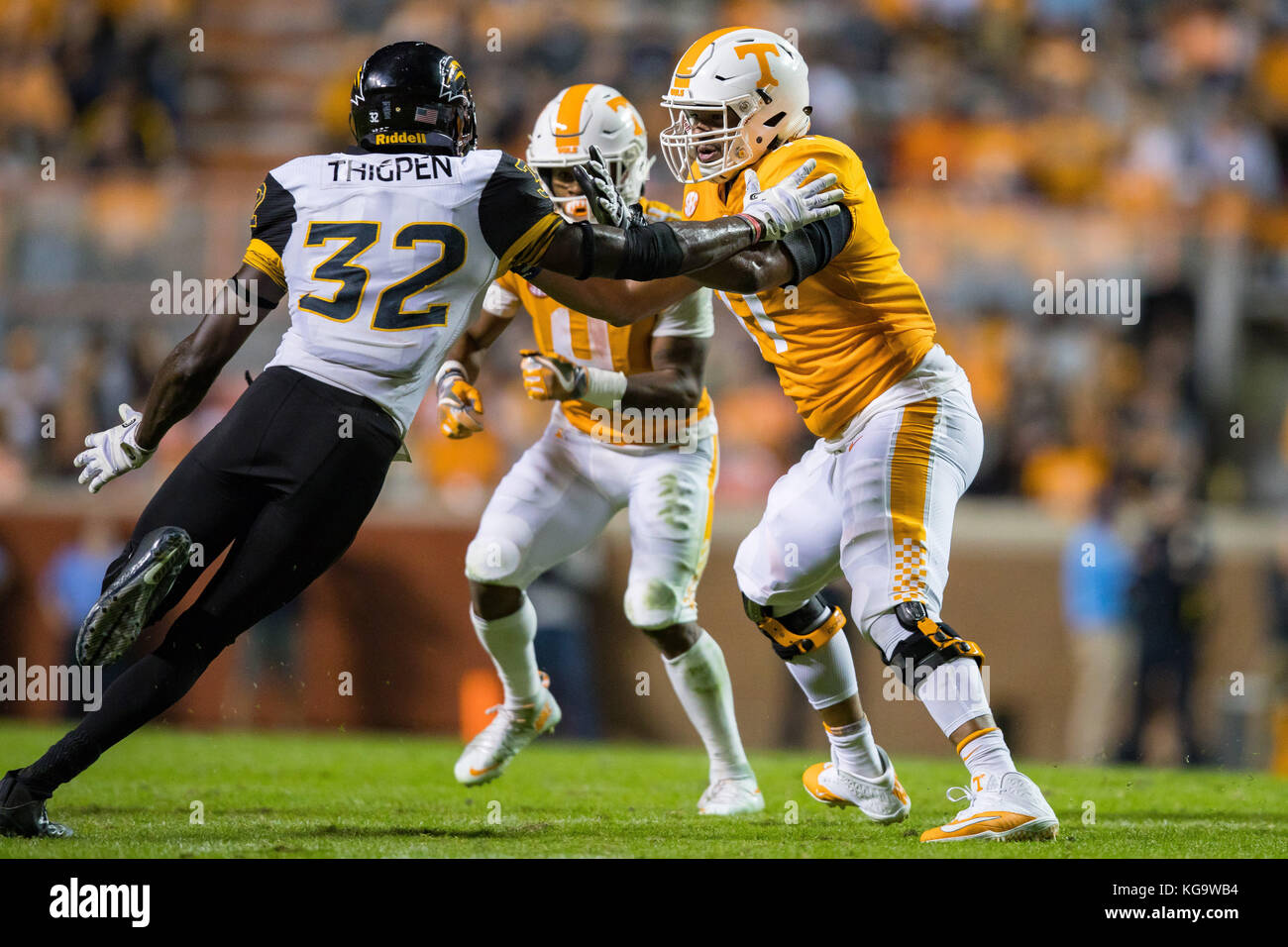 November 4, 2017: Devante Brooks #77 of the Tennessee Volunteers blocks Xavier Thigpen #32 of the Southern Miss Golden Eagles during the NCAA Football game between the University of Tennessee Volunteers and the University of Southern Mississippi Golden Eagles at Neyland Stadium in Knoxville, TN Tim Gangloff/CSM Stock Photo