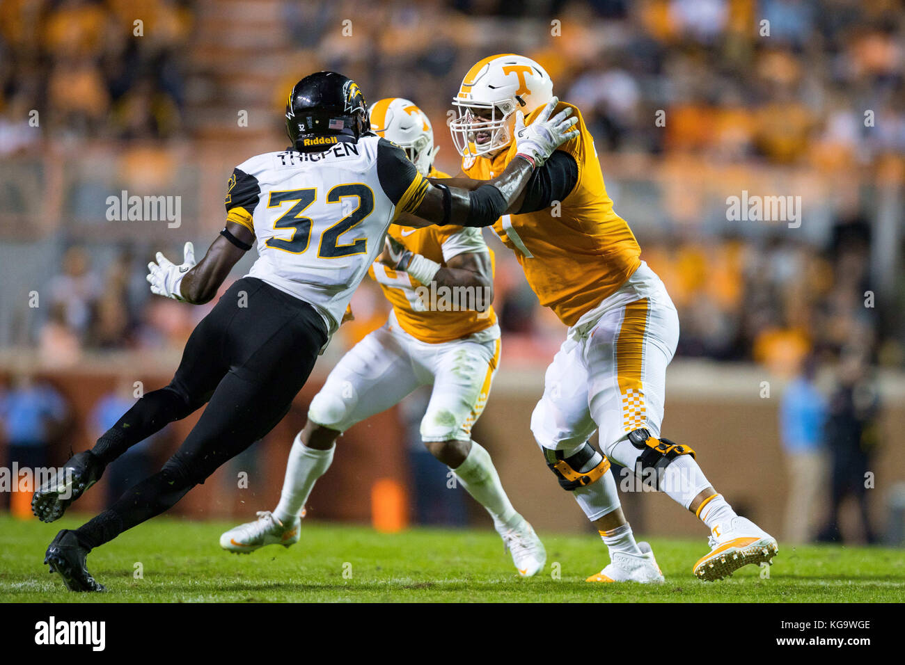 November 4, 2017: Devante Brooks #77 of the Tennessee Volunteers blocks Xavier Thigpen #32 of the Southern Miss Golden Eagles during the NCAA Football game between the University of Tennessee Volunteers and the University of Southern Mississippi Golden Eagles at Neyland Stadium in Knoxville, TN Tim Gangloff/CSM Stock Photo