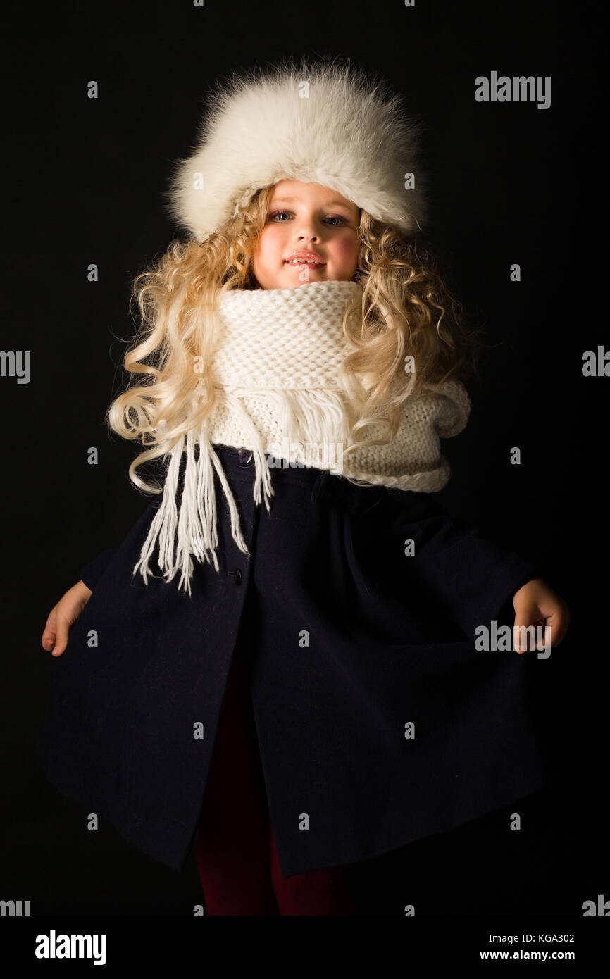 Pretty girl in winter clothes Stock Photo Alamy