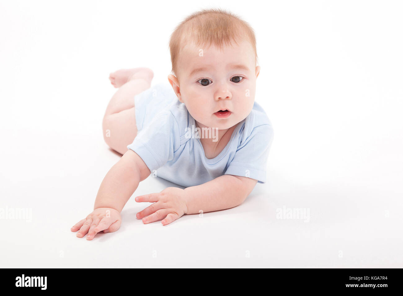 Baby In The Body Lying On His Stomach On A White Background And Stock Photo Alamy