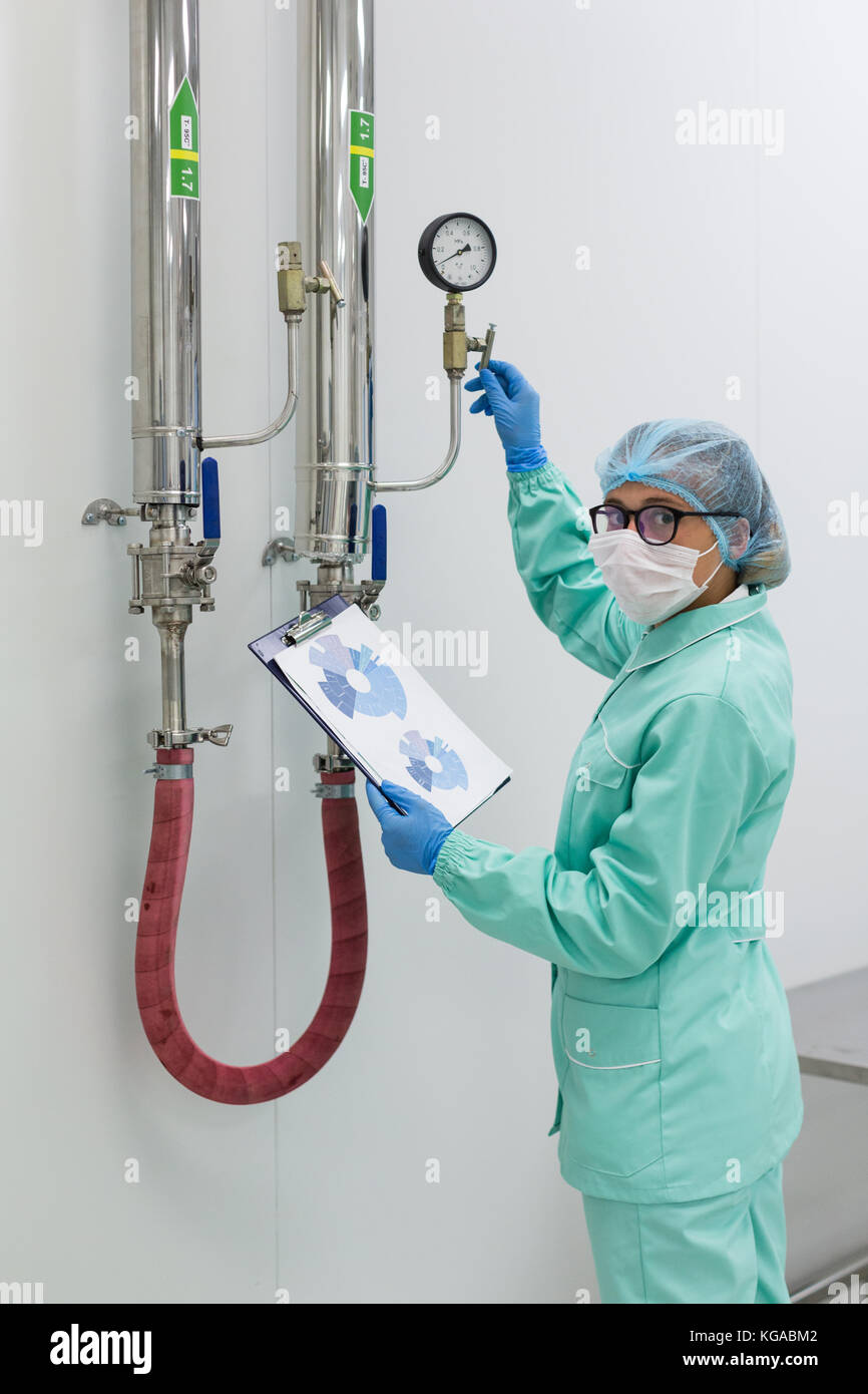 scientist is working with pressure meter Stock Photo Alamy