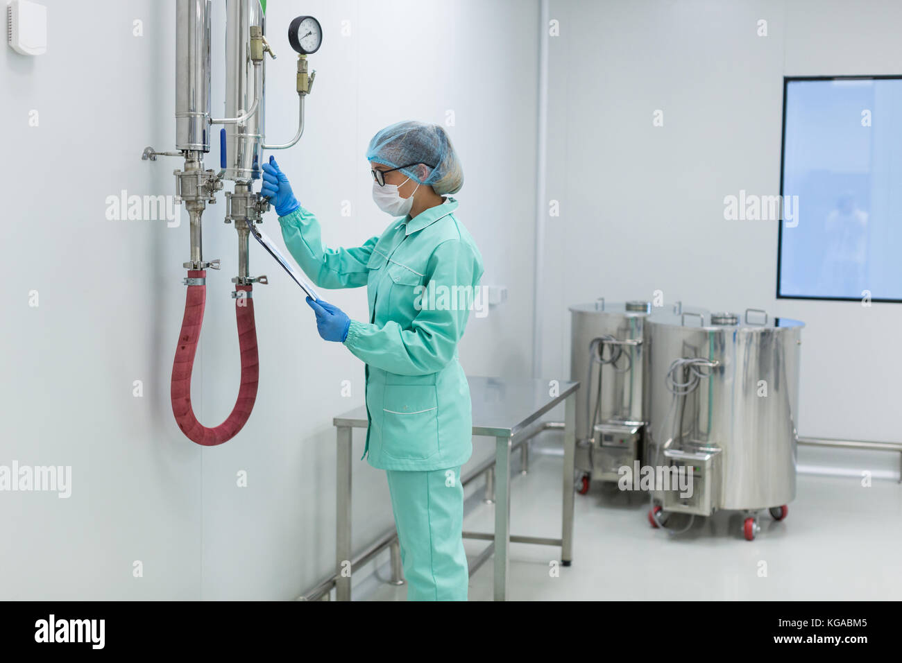 scientist works with compression valve Stock Photo Alamy