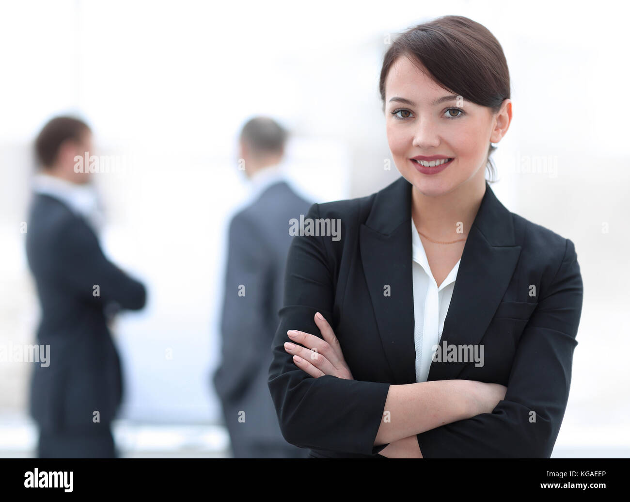 successful young business woman on the background of the office Stock ...