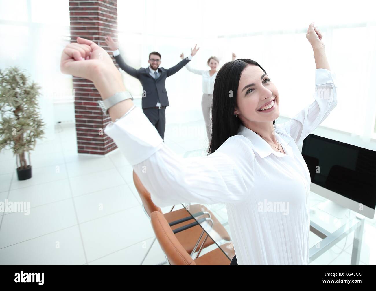 successful happy business woman sitting at the desk Stock Photo - Alamy