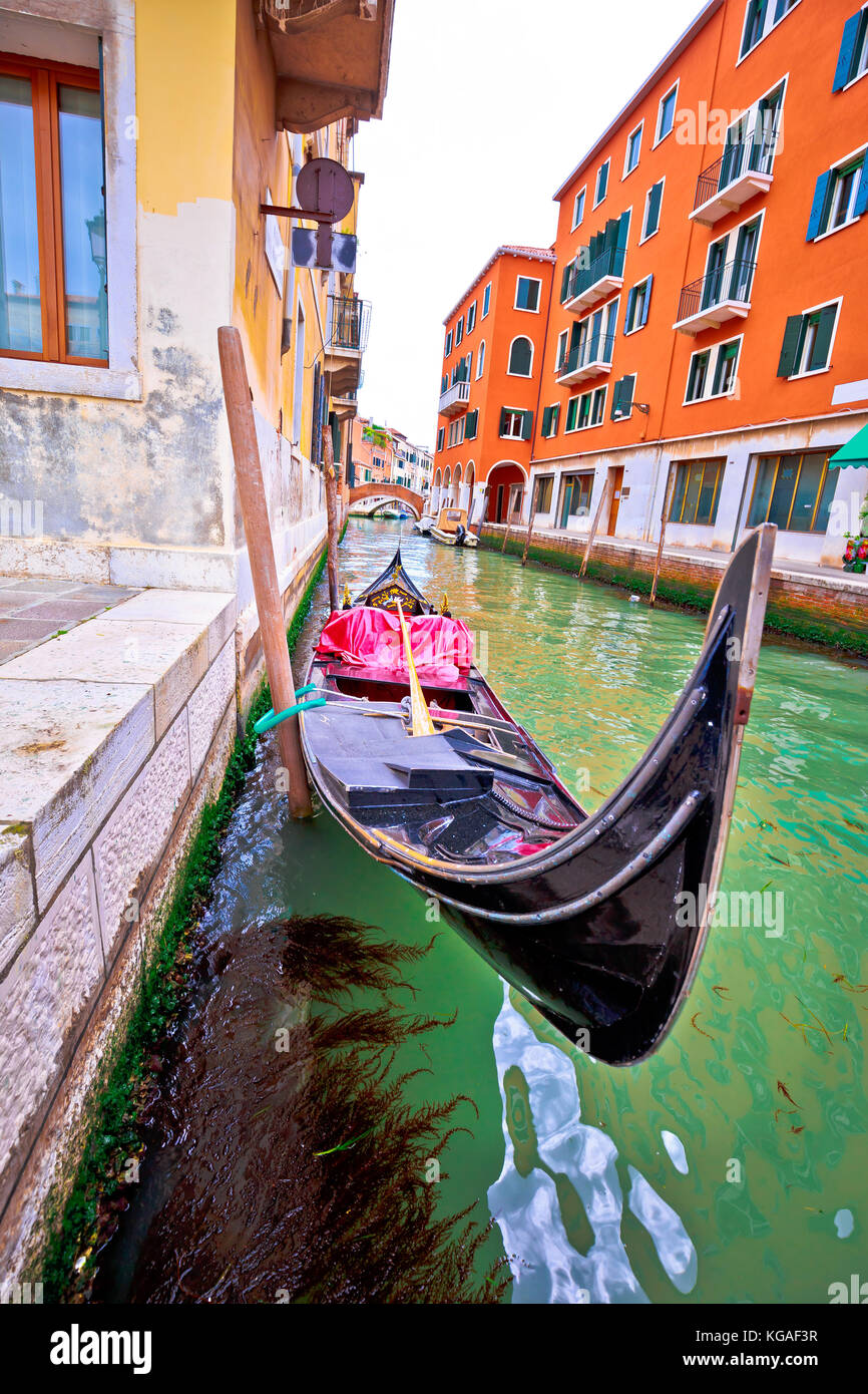 Gondola in narrow Venice channel view, Veneto region in Italy Stock Photo