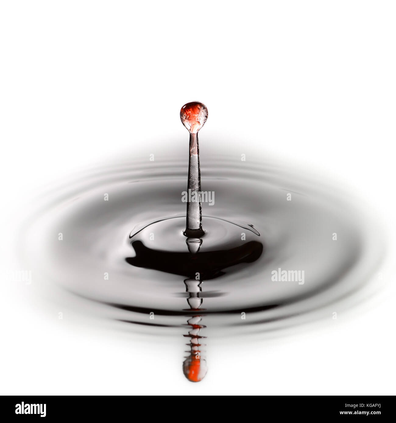 Cherry juice drop splash in water Stock Photo