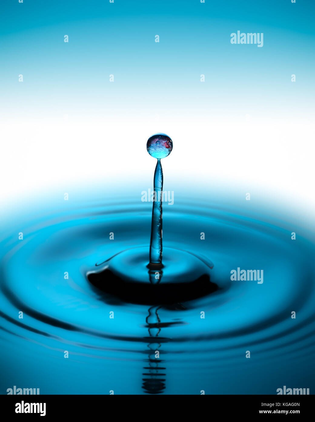 Colored water drop splash Stock Photo