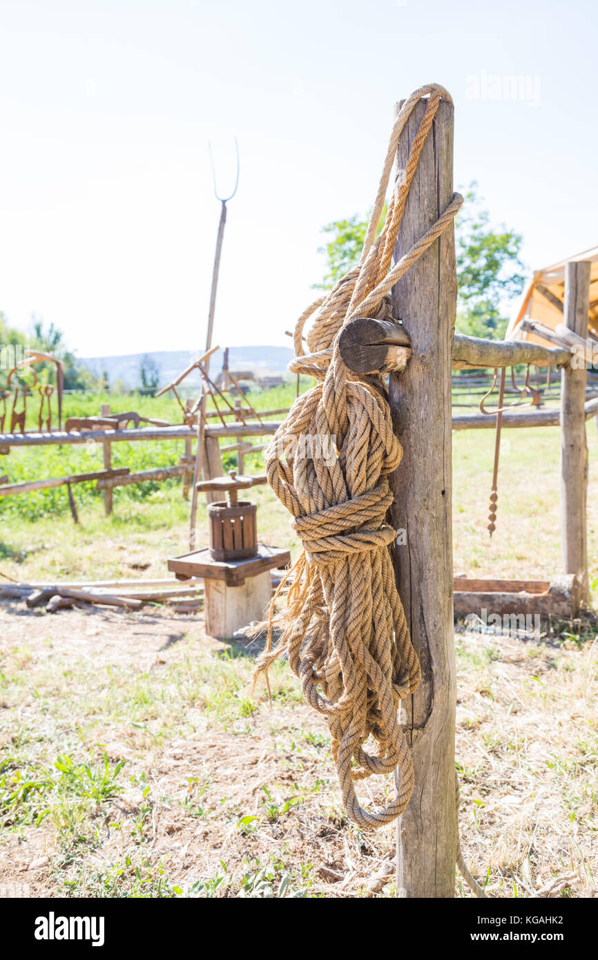 Old hemp rope attached to a wooden fence Stock Photo Alamy
