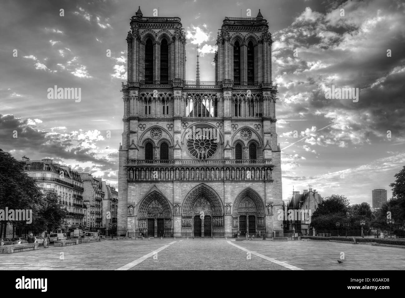 Notre Dame cathedral in Paris, France, at sunrise. Scenic skyline. Travel background. Stock Photo