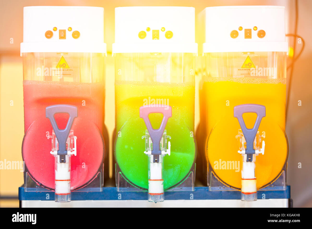 https://c8.alamy.com/comp/KGAKH8/crushed-fruit-ice-drink-dispensers-with-color-refreshments-KGAKH8.jpg