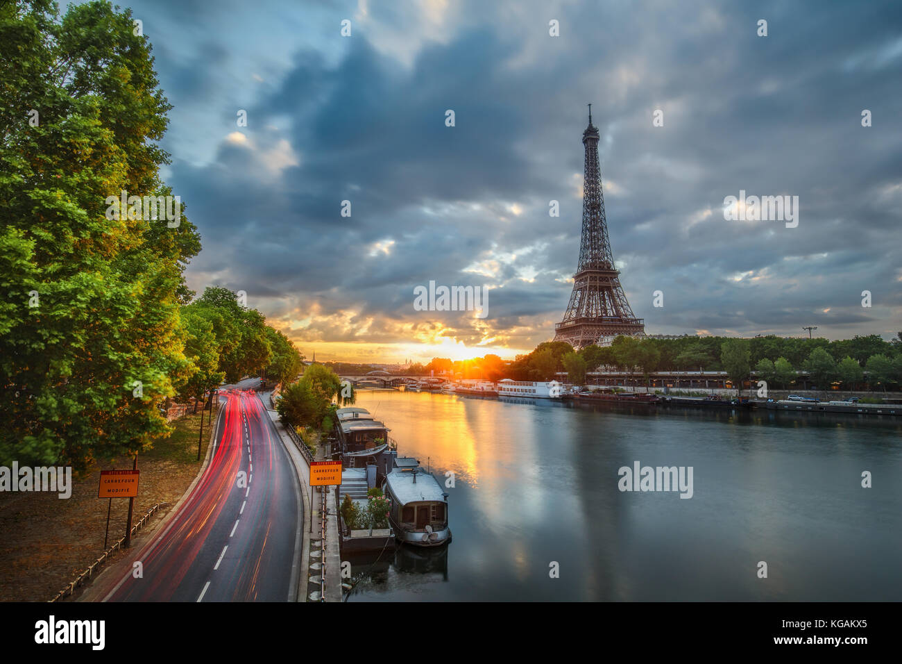 Scenic view over the Eiffel Tower from a bridge at sunrise. Paris